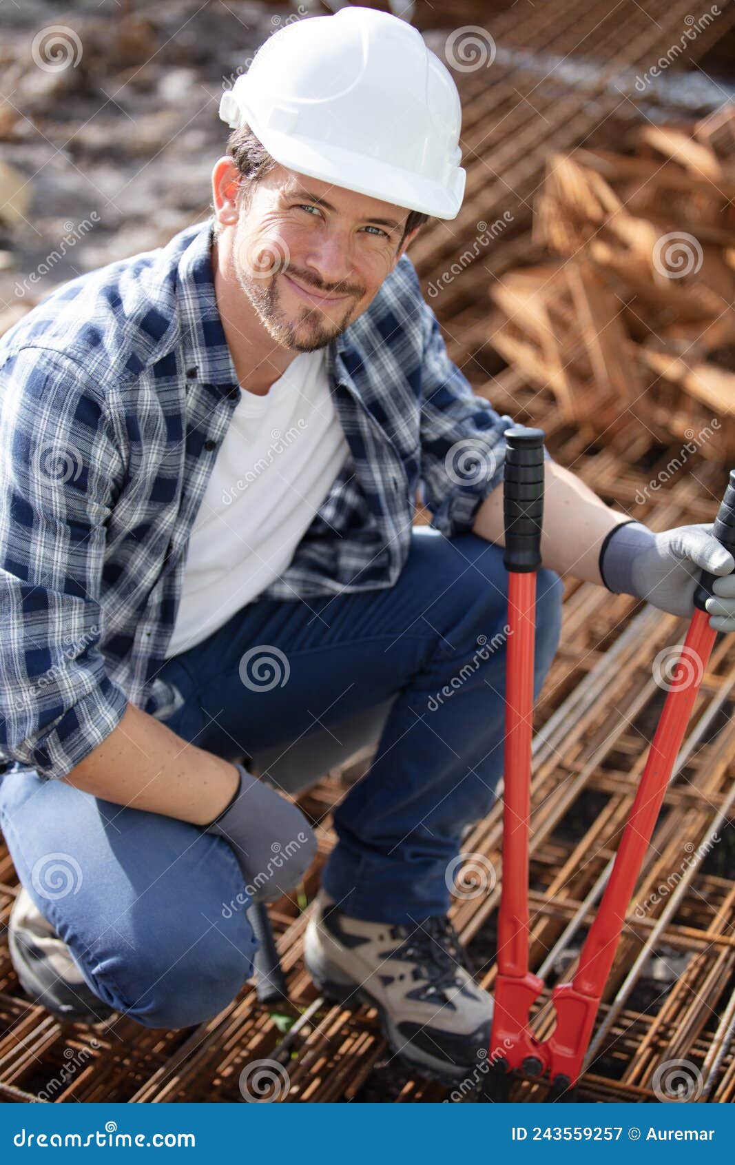 construction worker at construction site assembling falsework