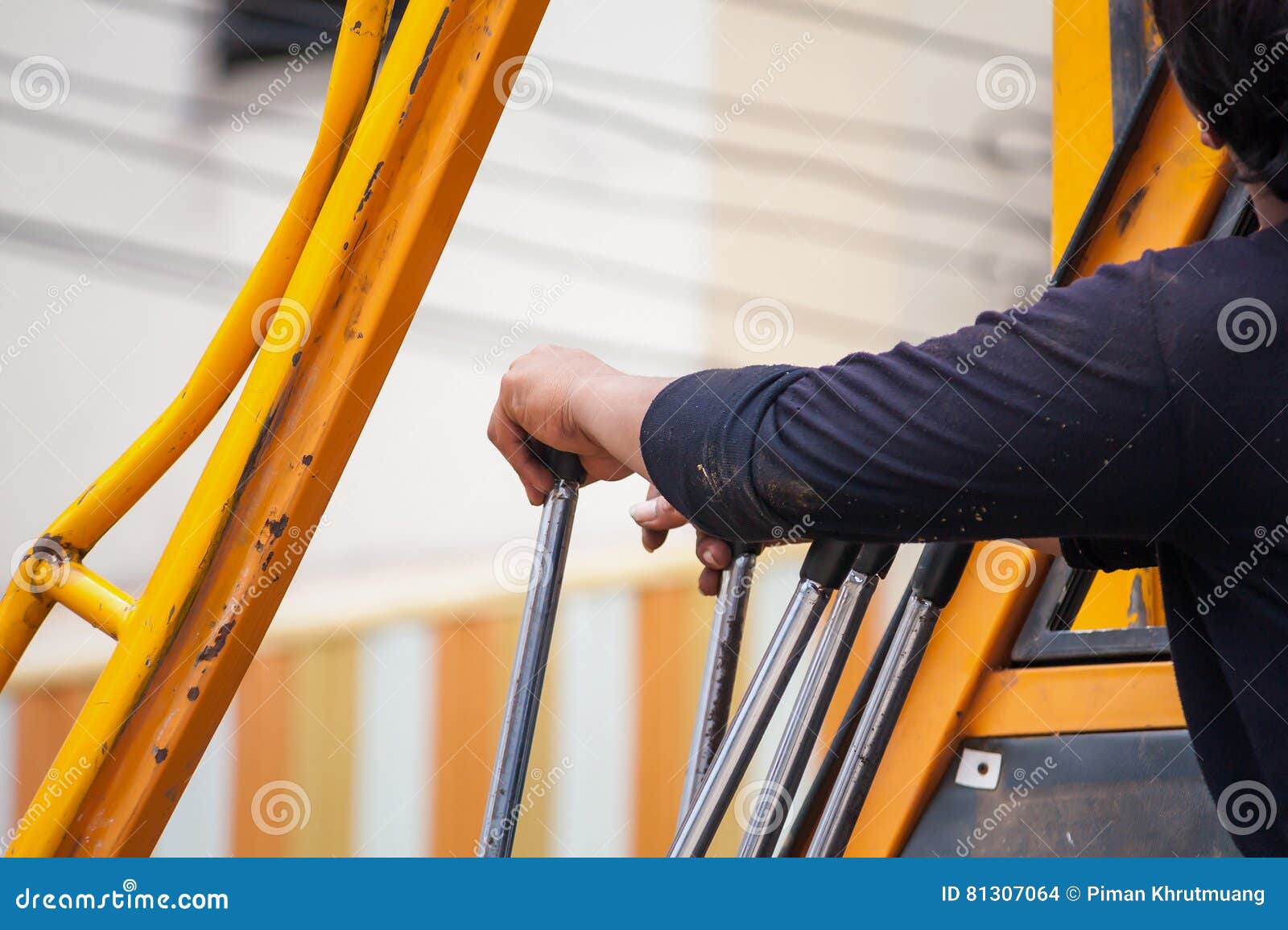 Construction Worker Controls of Lifting Crane Stock Photo Image of