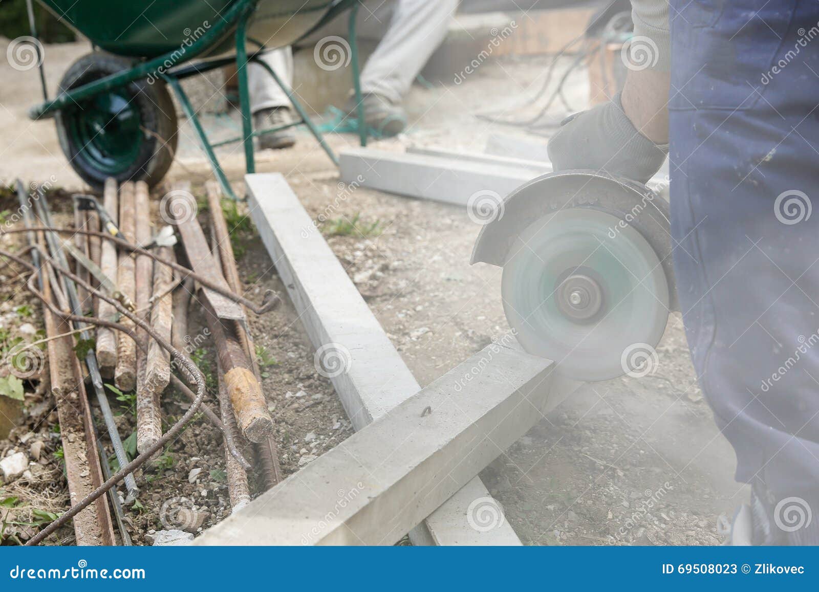Construction Worker Cutting a Reinforced Concrete Pillar Stock Image
