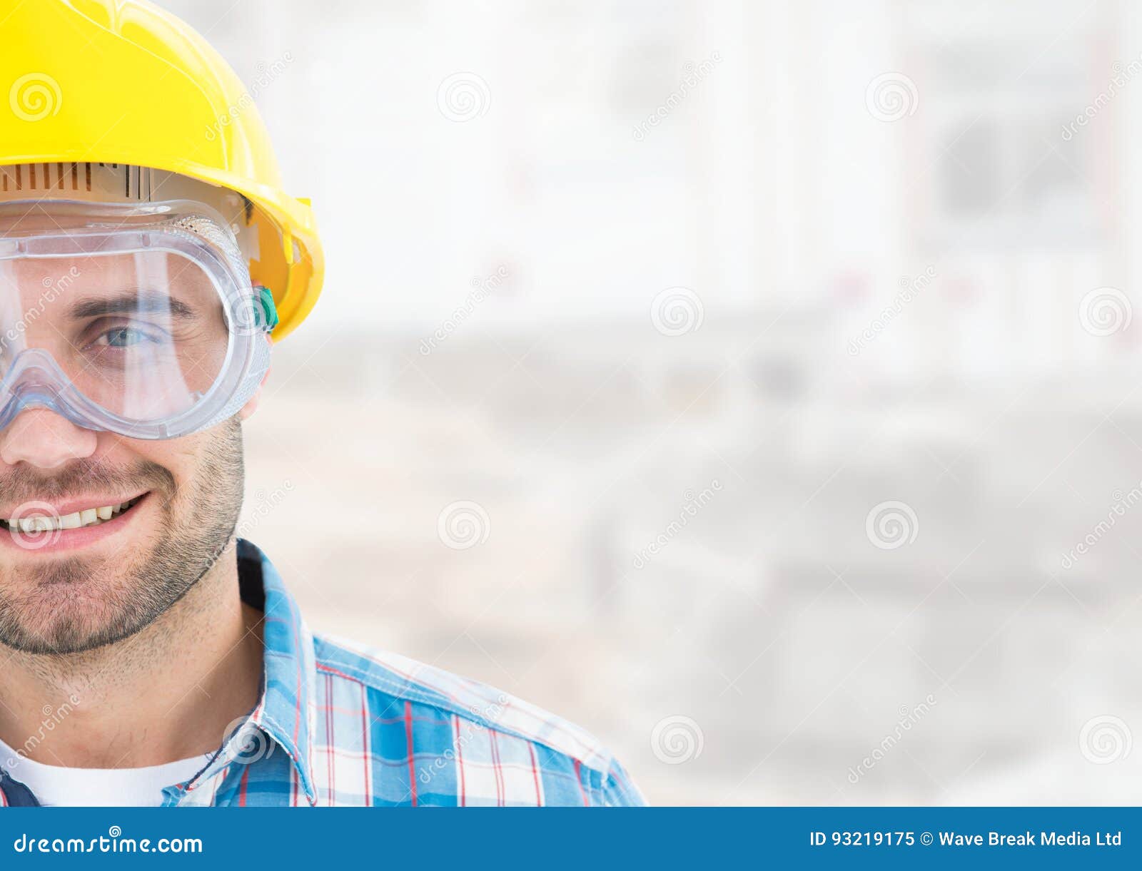 Construction Worker with Eye Protection Goggles in Front of