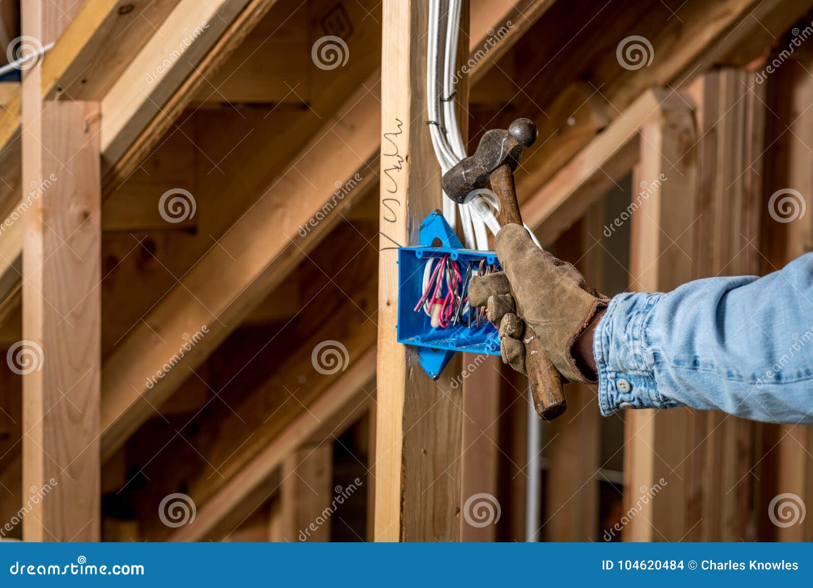 Construction Worker Hammers on an Electrical Box Stock Photo Image of building, construction