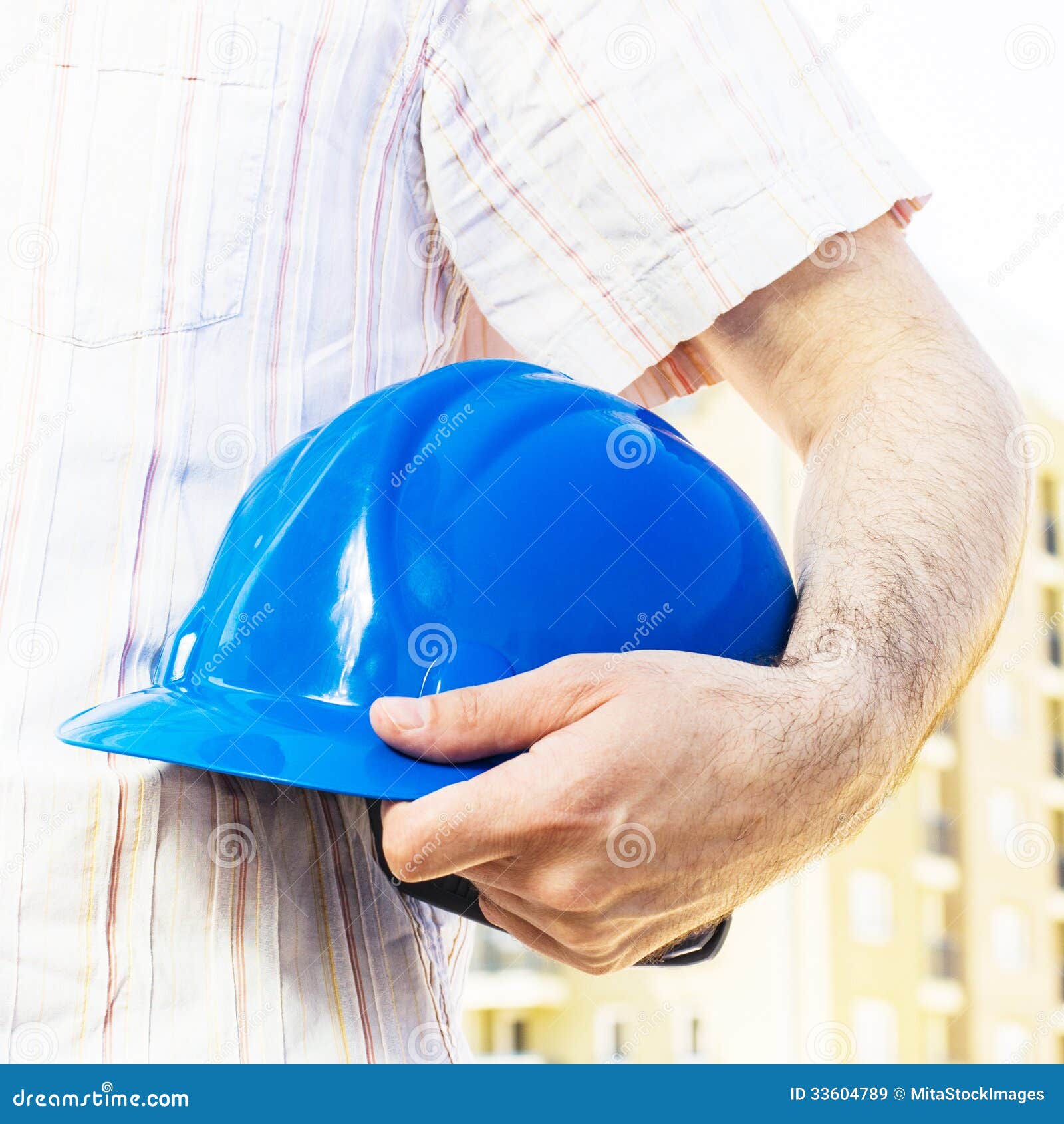Construction Worker Holding Blue Hard Hat Stock Image Image of industry, hand 33604789