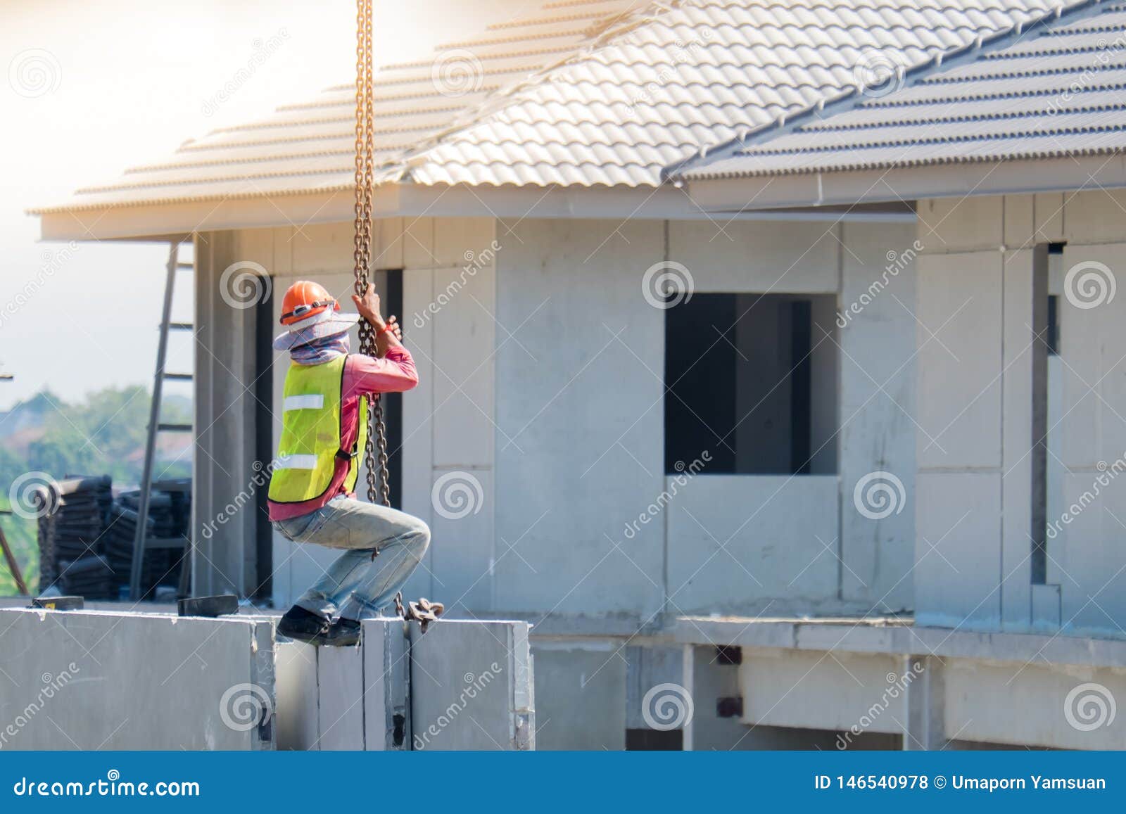 Construction Worker Are Installing Crane Hooks At The Precast