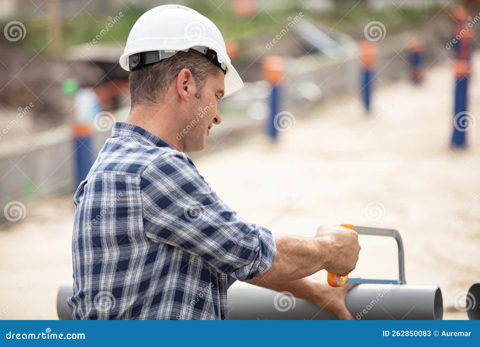 Construction Worker Laying Foundations at Building Site Stock Image