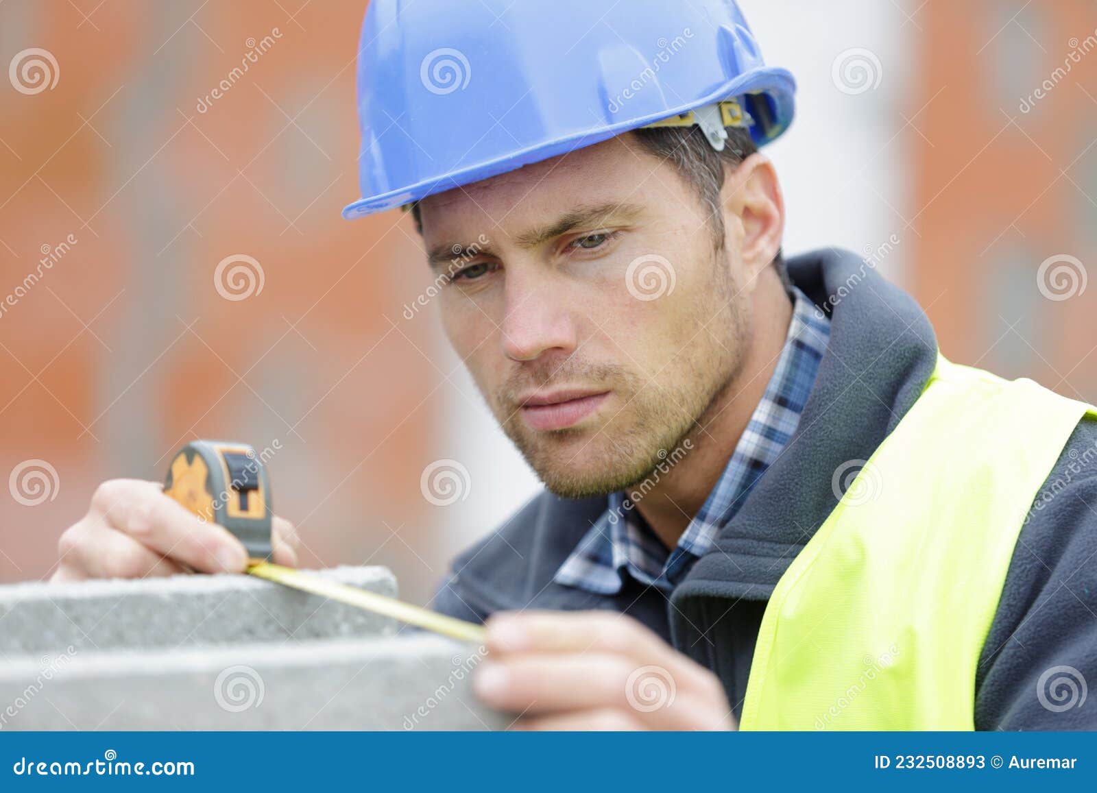 Construction Worker Measuring Cement Block Stock Image Image of