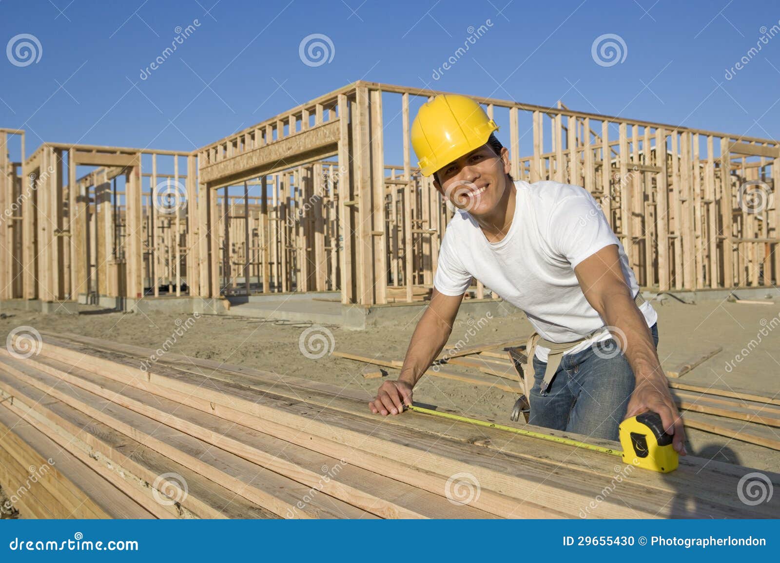 Construction Worker Measuring Planks Stock Photo Image of contractor