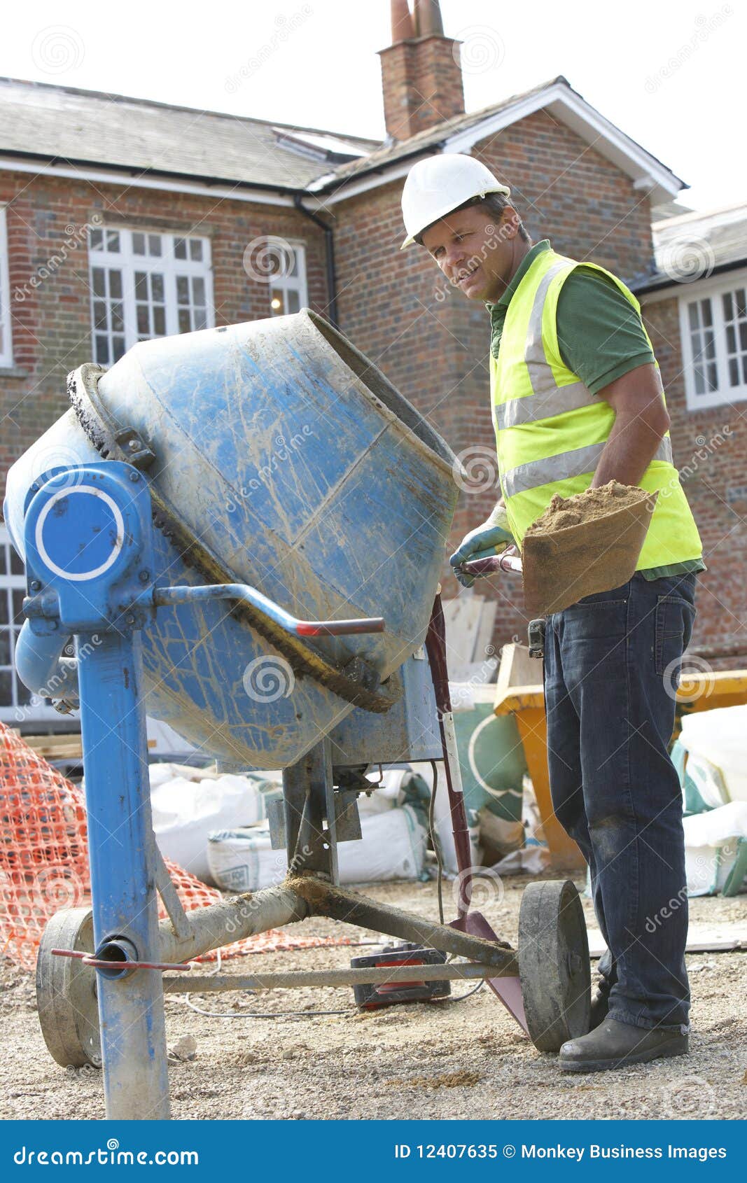 Construction Worker Mixing Cement Stock Image Image of middle