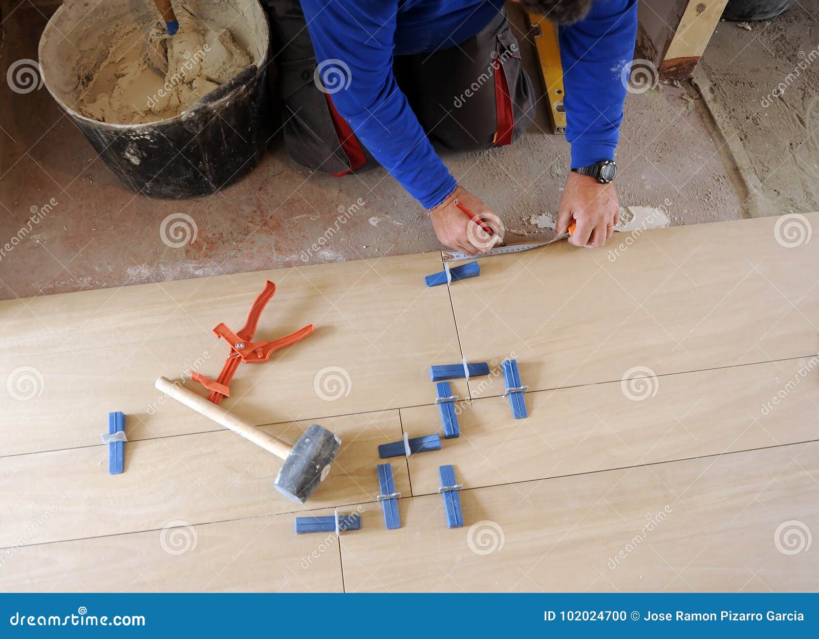 Construction Worker Placing a Porcelain Tile Floor Stock Photo Image