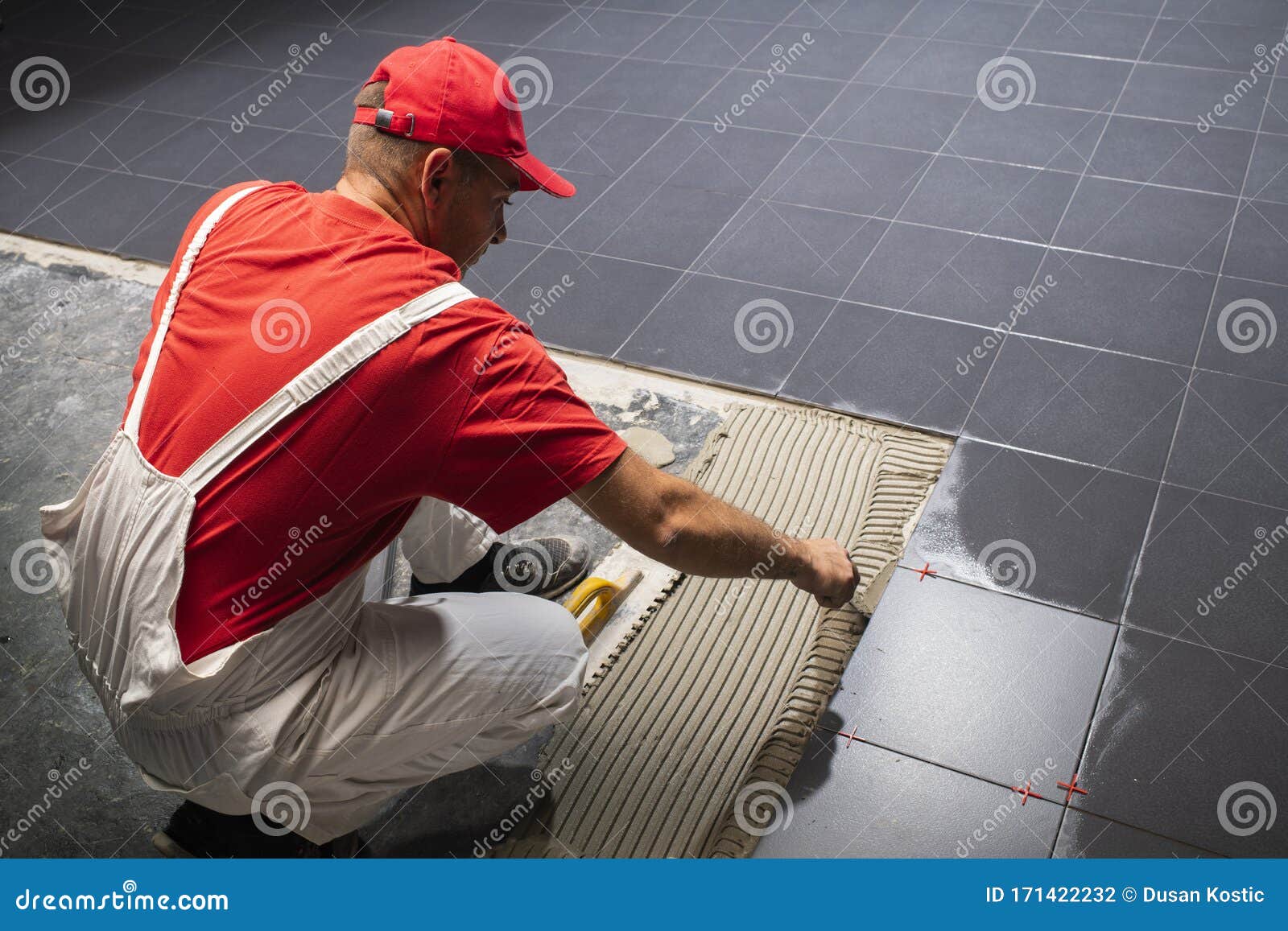 Floor Ceramic Tiles Installation. Create, Arranging Stock Photo Image
