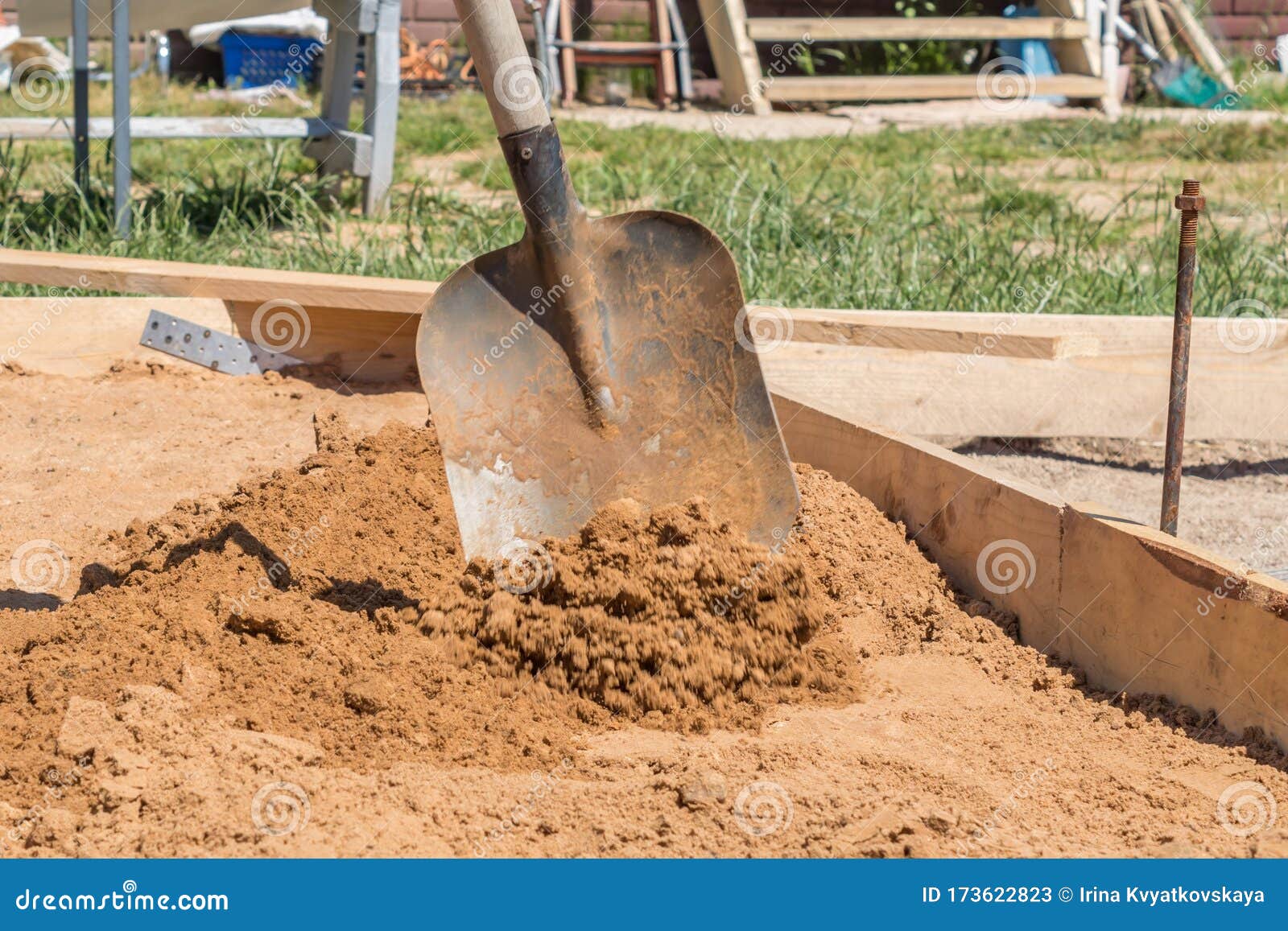Construction Worker with a Shovel, Foundation Preparation on