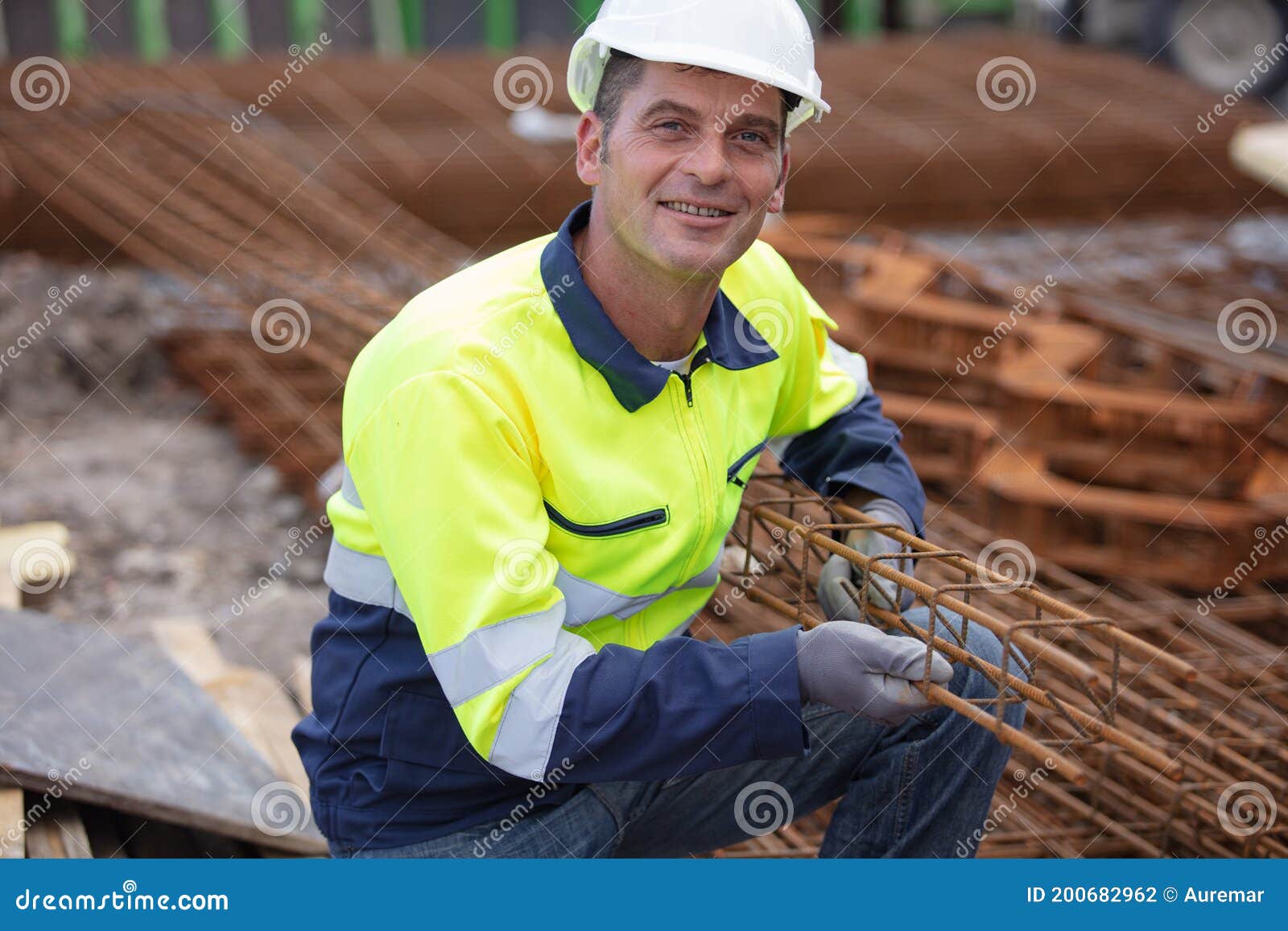 construction worker at construction site assembling falsework