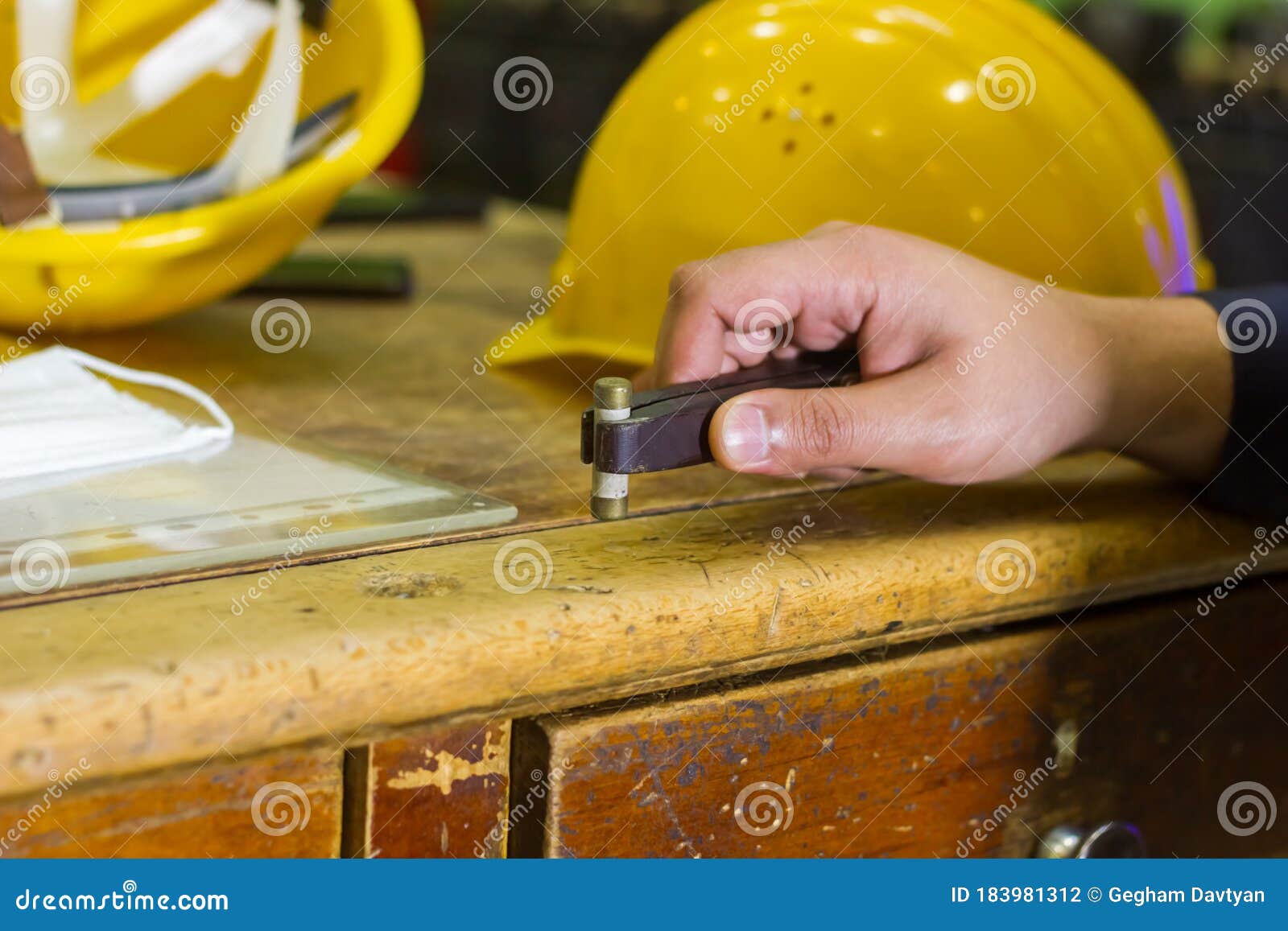 Construction Worker Using a Black Holder Stock Photo Image of