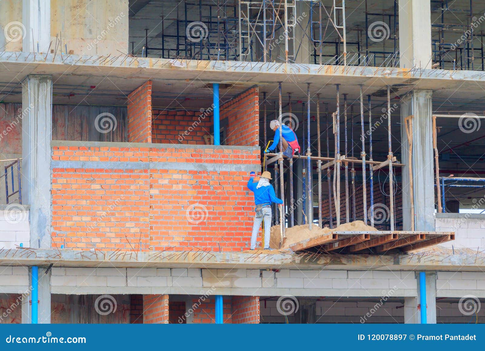 Construction Workers Building Develop of Housing at Laborer Work