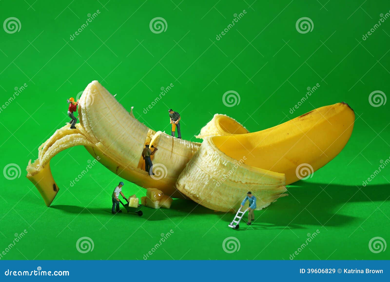 construction workers in conceptual food imagery with banana