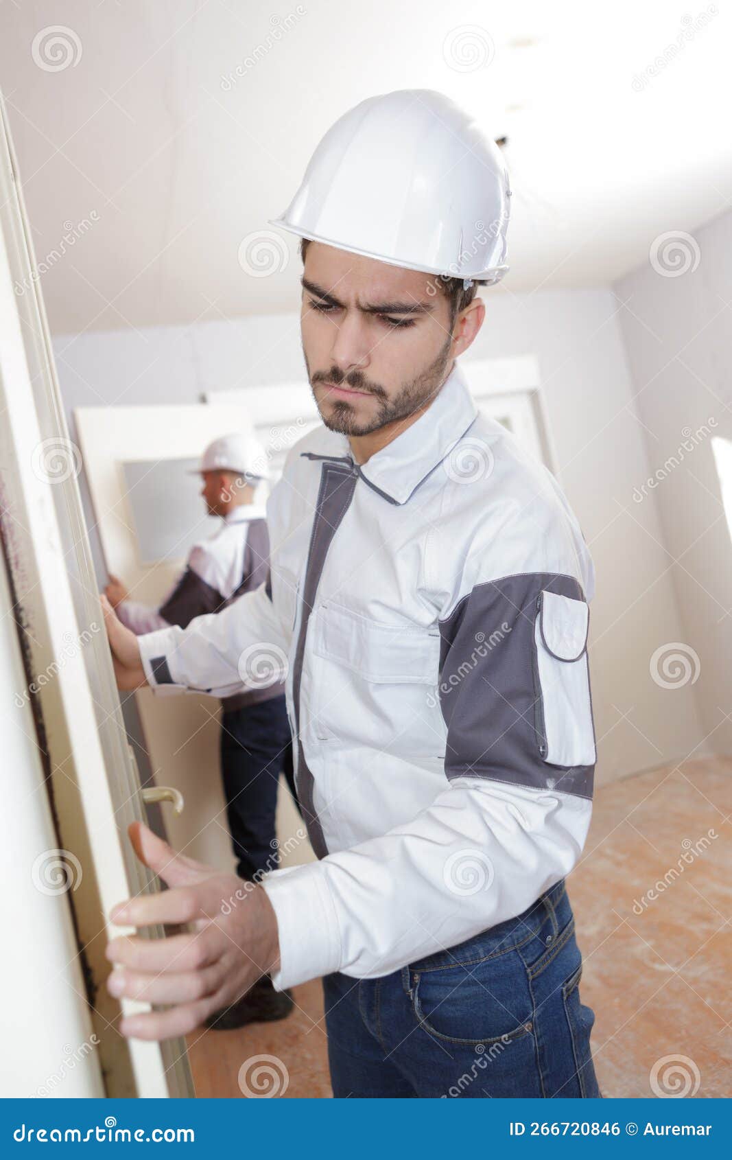 Construction Workers Fitting Doors Stock Photo Image of house, health