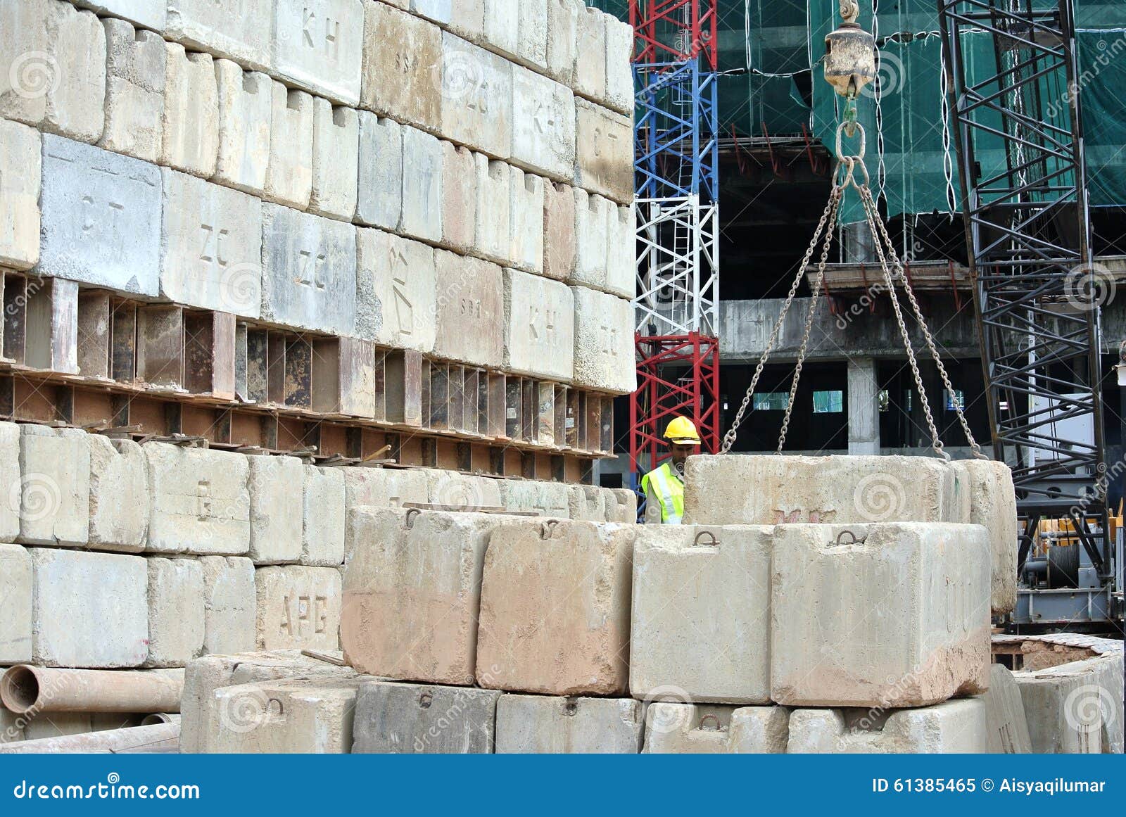Construction Workers Stacking The Maintain Load Test Block At The