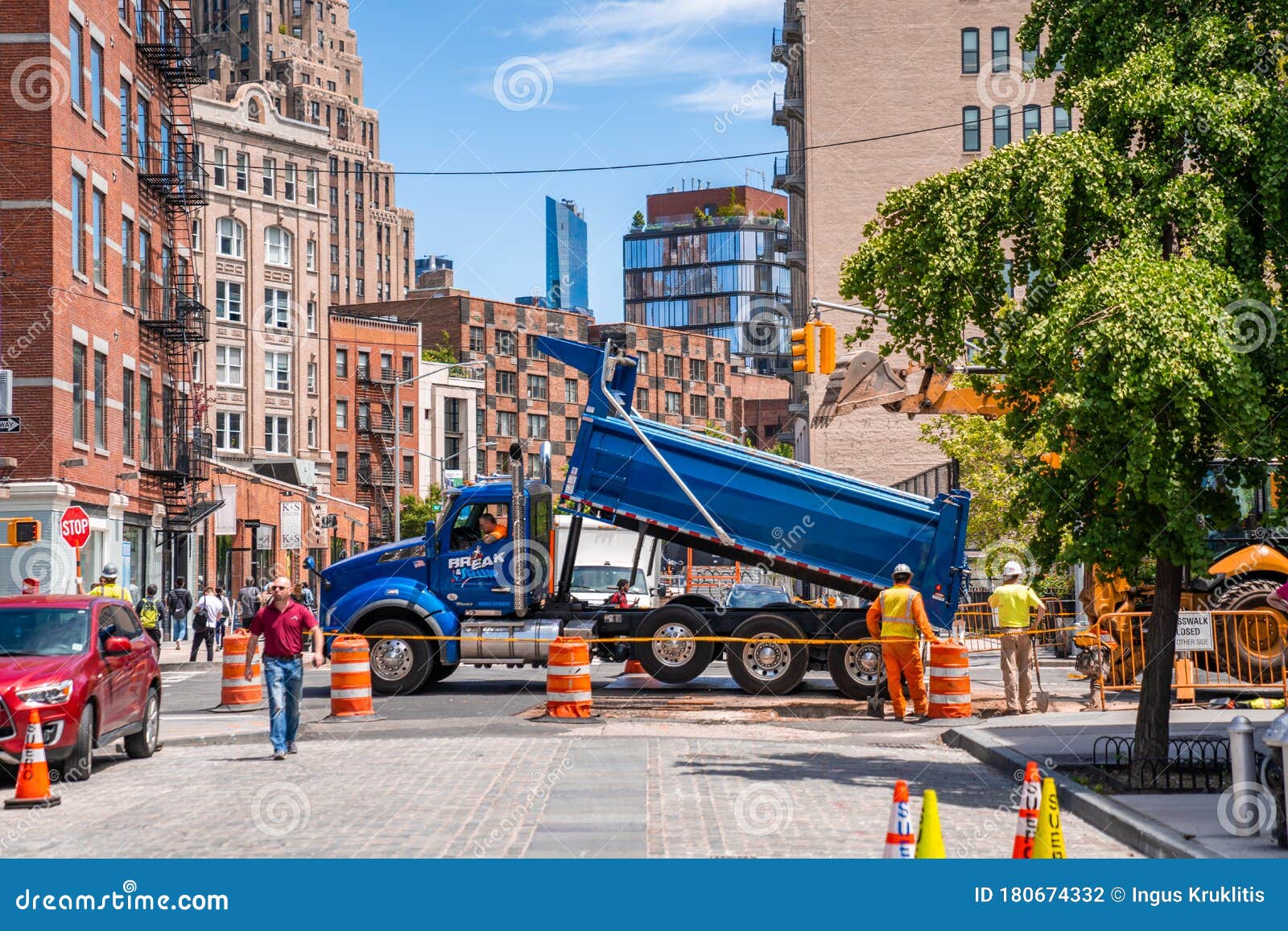 New York Construction Workers Seen Repairing Roadways Near Times Square