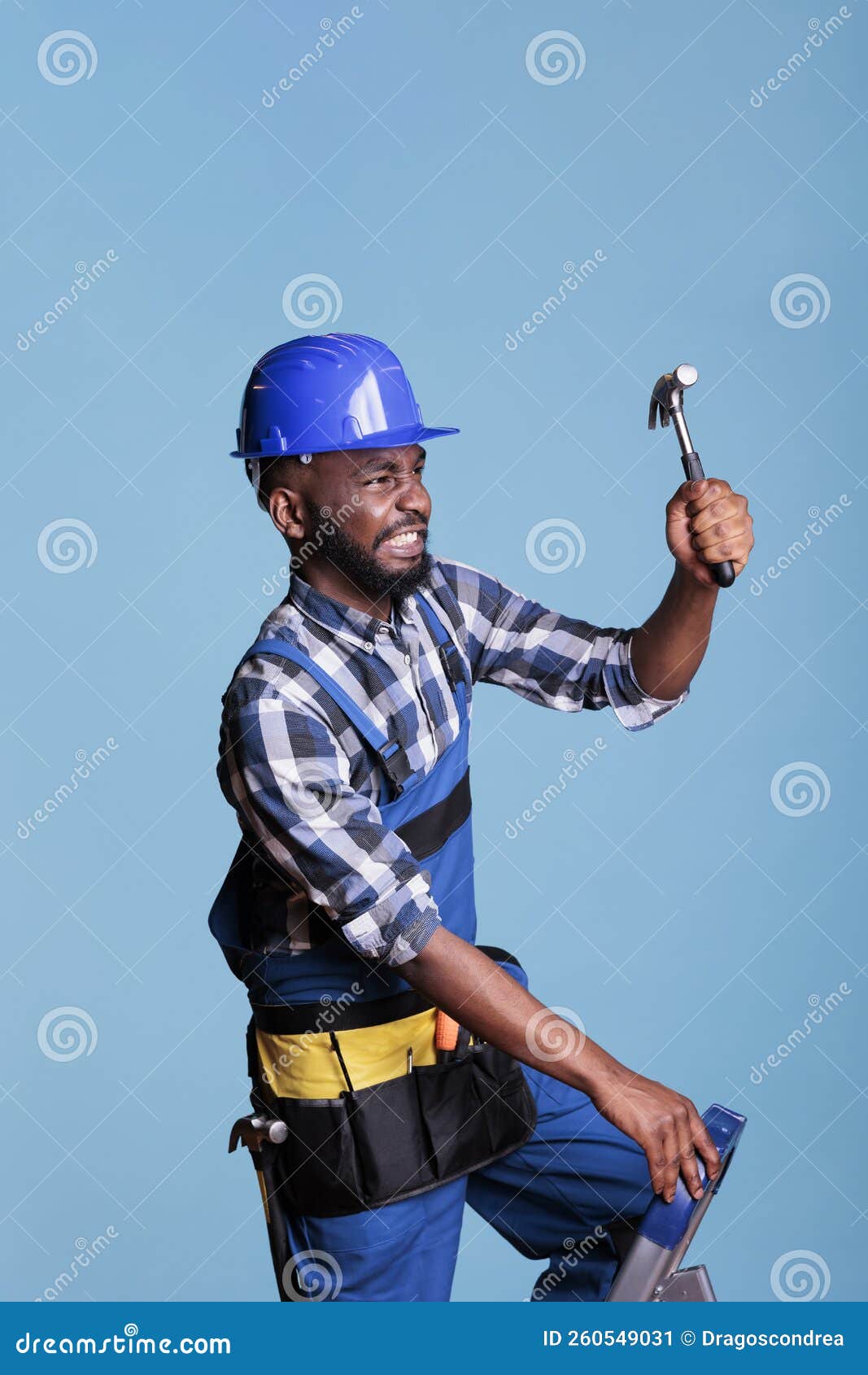 Constructor Using Hammer on Wall with Strength Stock Image Image of