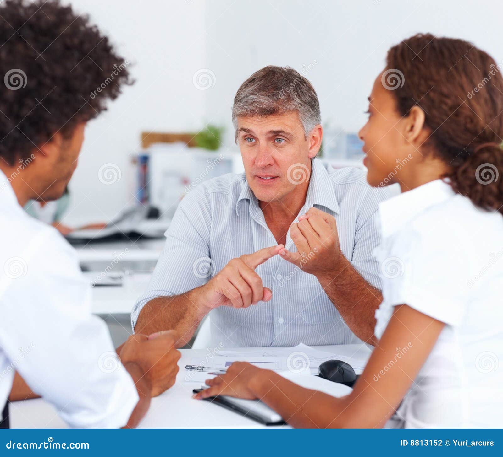 Consultant Discussing with Colleagues at Work Stock Photo - Image of ...