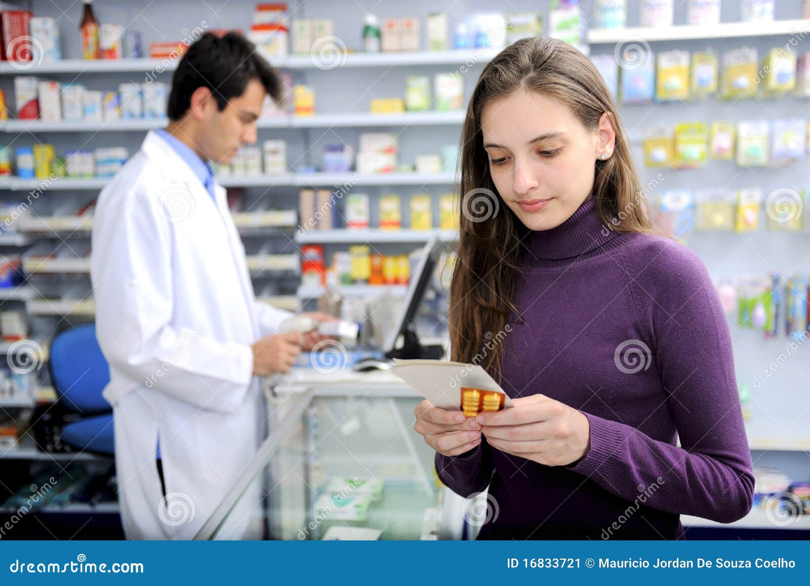 consumer with medicine at pharmacy