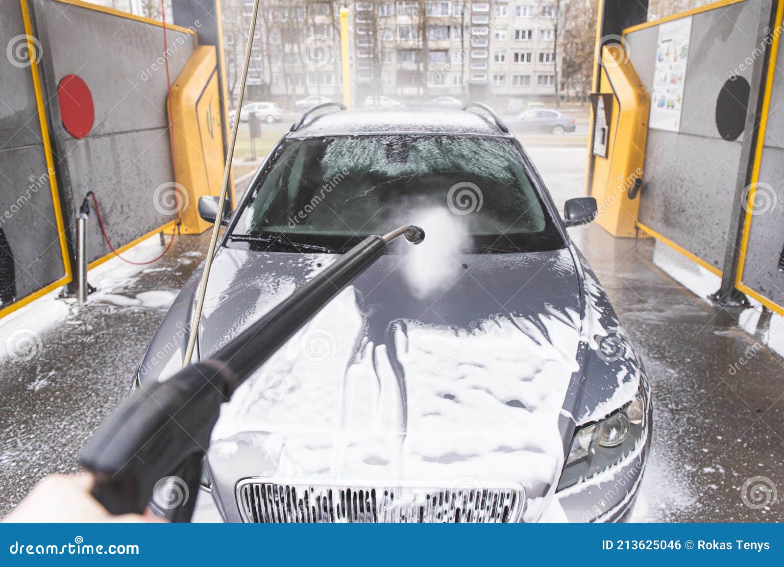 Contactless Car Wash Self Service System. Washing Dirty Car in Car Wash