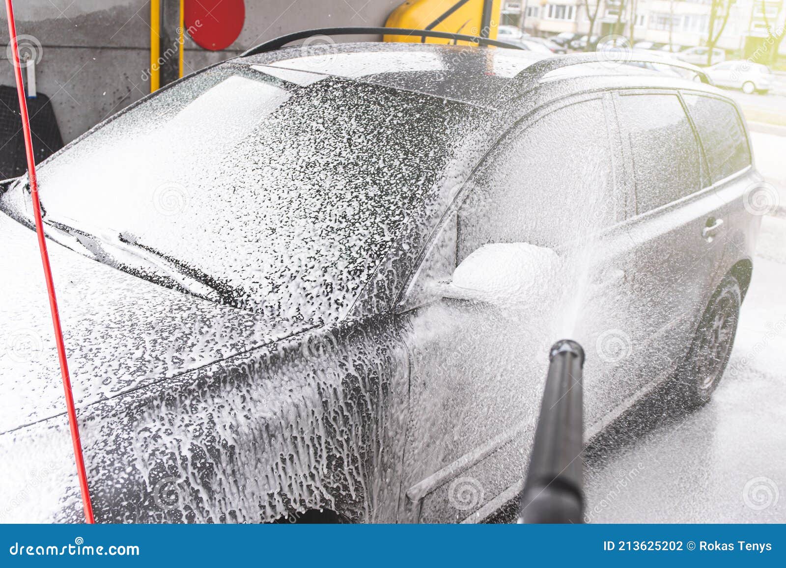 Contactless Car Wash Self Service System. Washing Dirty Car in Car Wash