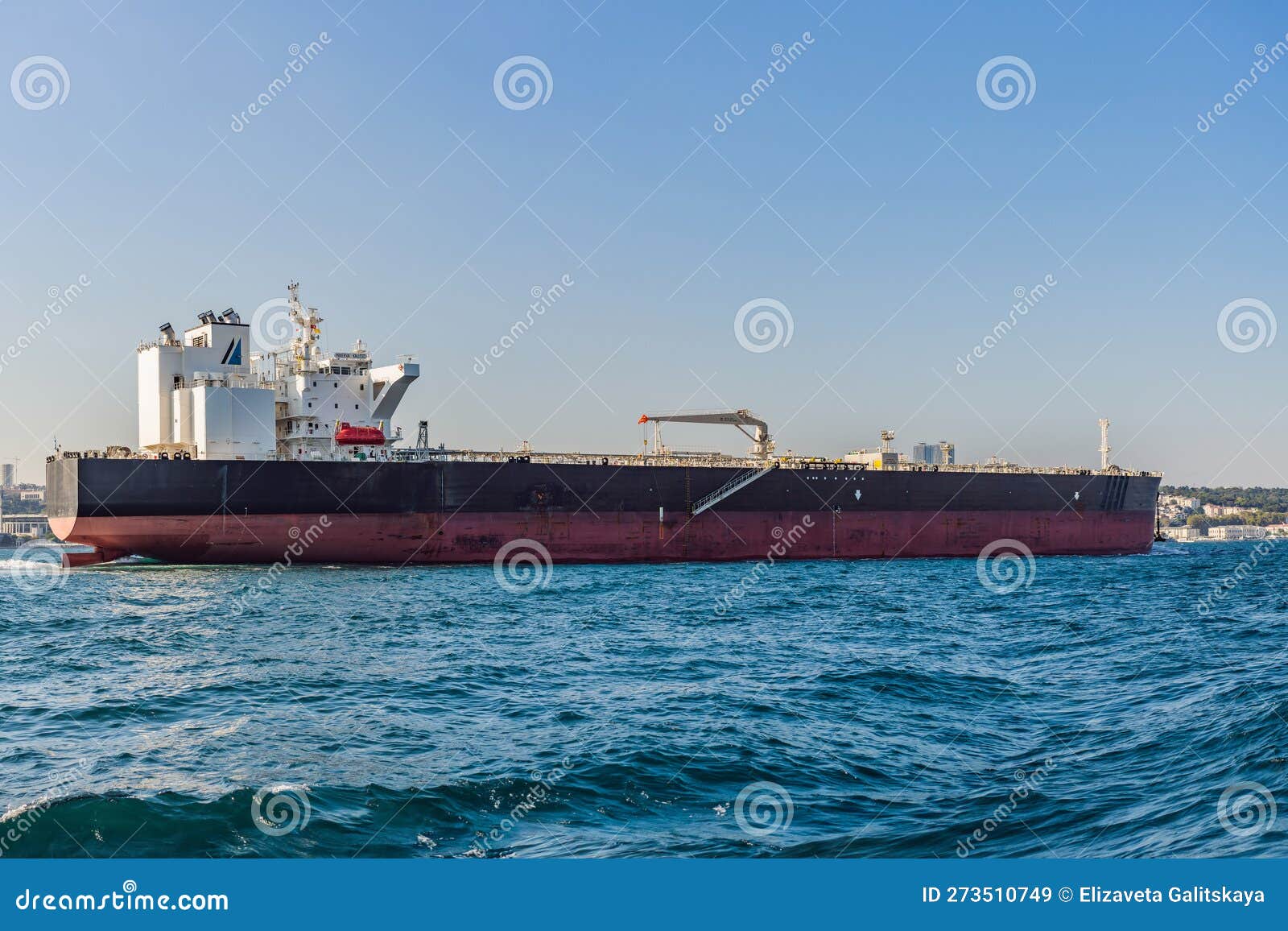 Container Cargo Ship in the Bosphorus, Istanbul, Turkey Stock Image