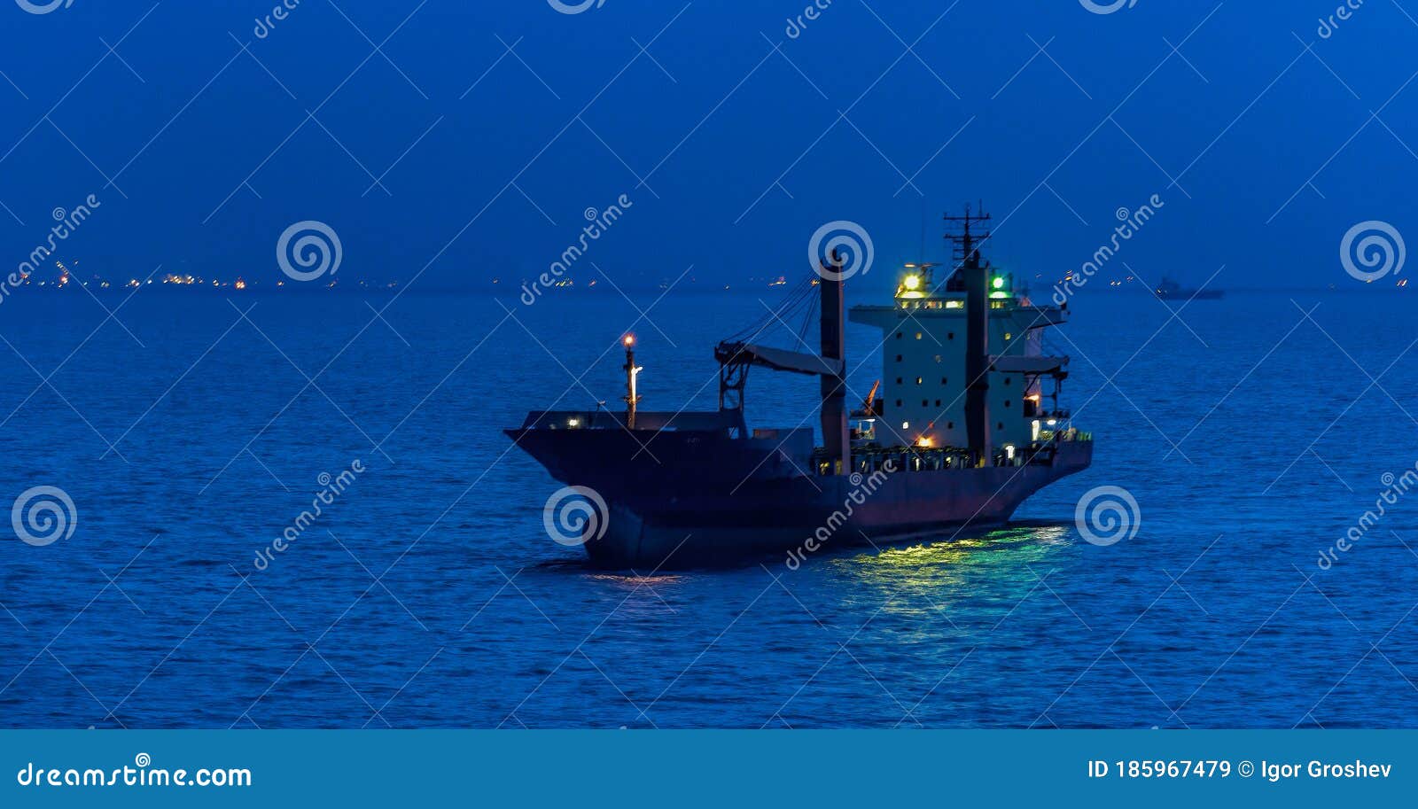 Container Cargo Ship with Night blue, Image Anchored Outer - of Singapore Anchorage 185967479 of Image at in Navigation Stock Lights horizon