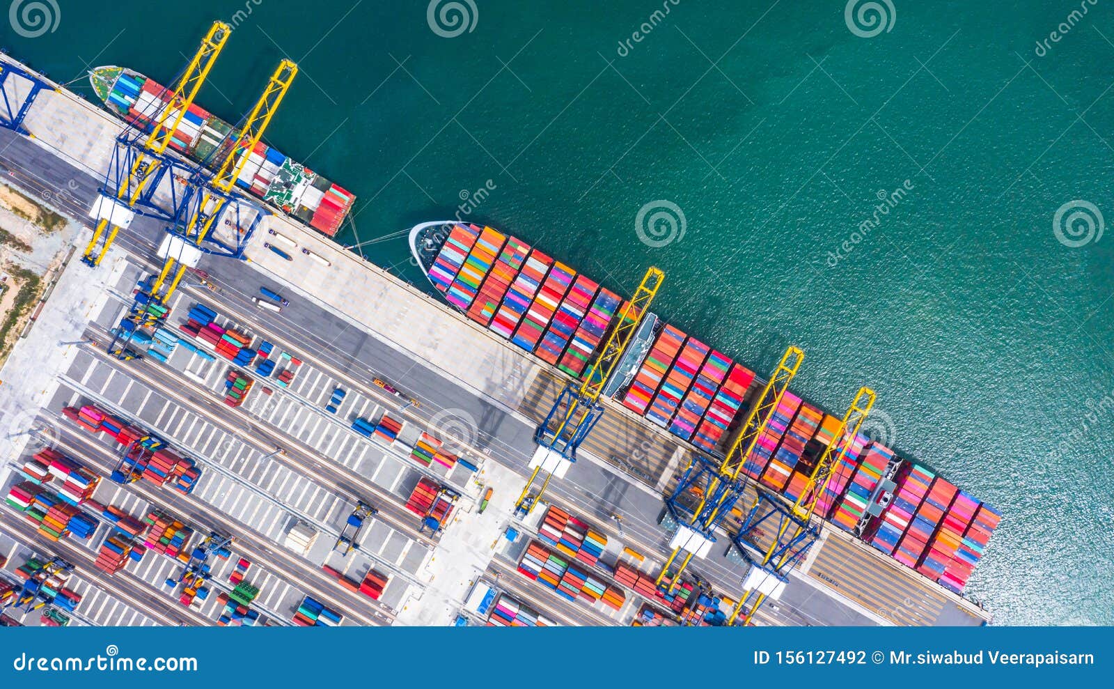 container ship loading and unloading in deep sea port, aerial top view of business logistic import and  export freight