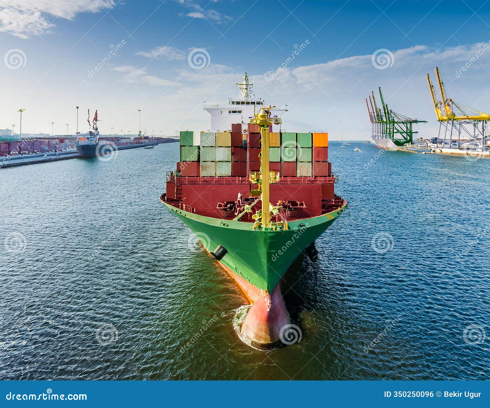 container ship in port terminal - huge freighter fully loaded