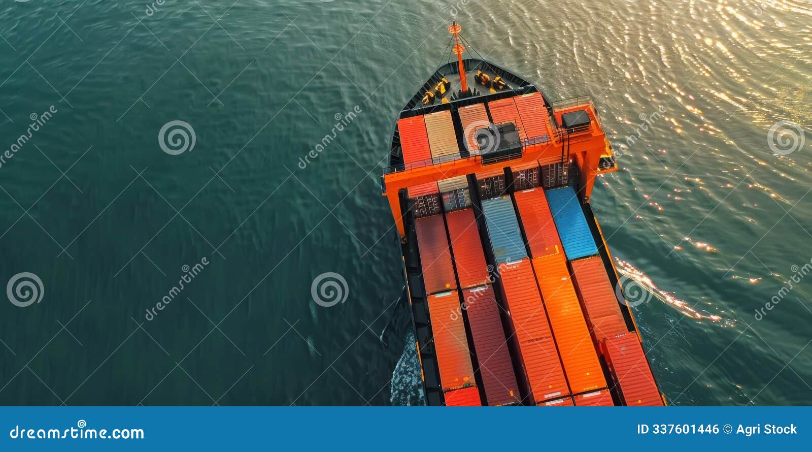 container ship sails across the ocean, carrying a load of goods to their destination