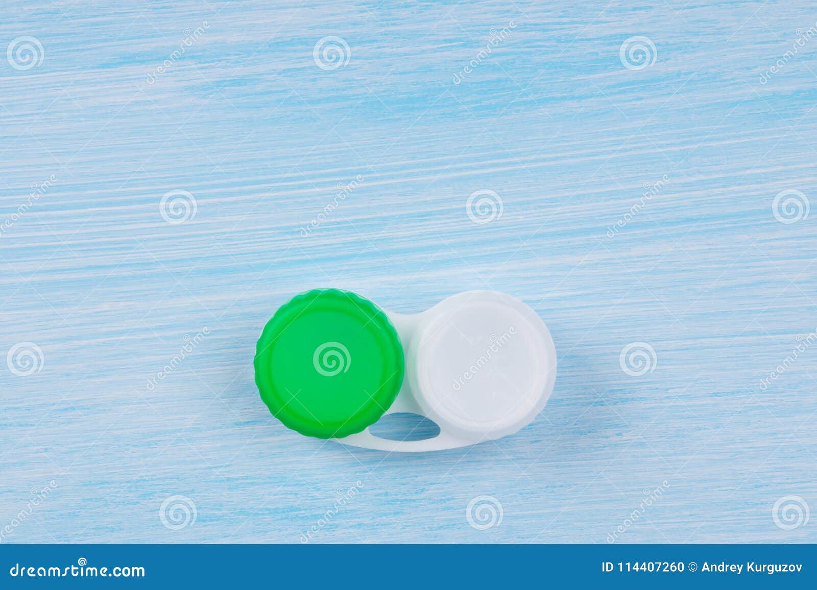 Container for Storing Contact Lenses, To Improve Vision, on a Blue