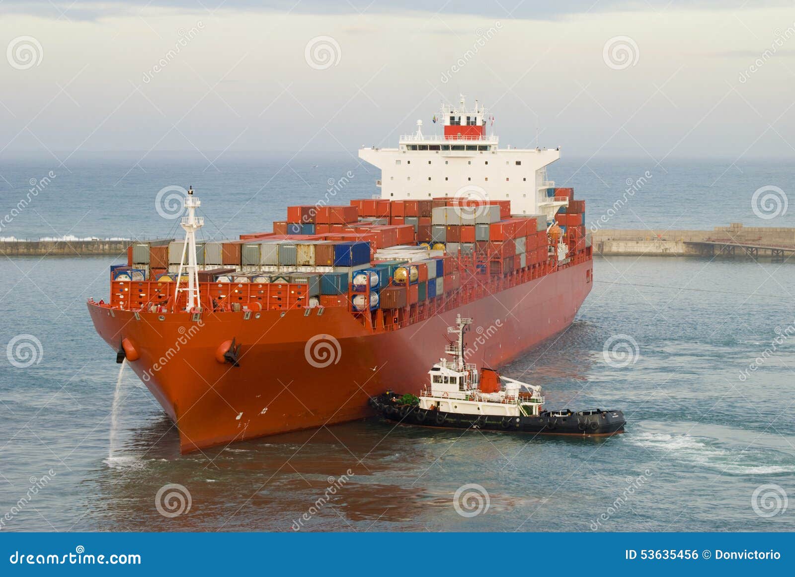 Container Vessel And A Small Tug Boat Stock Photo - Image ...