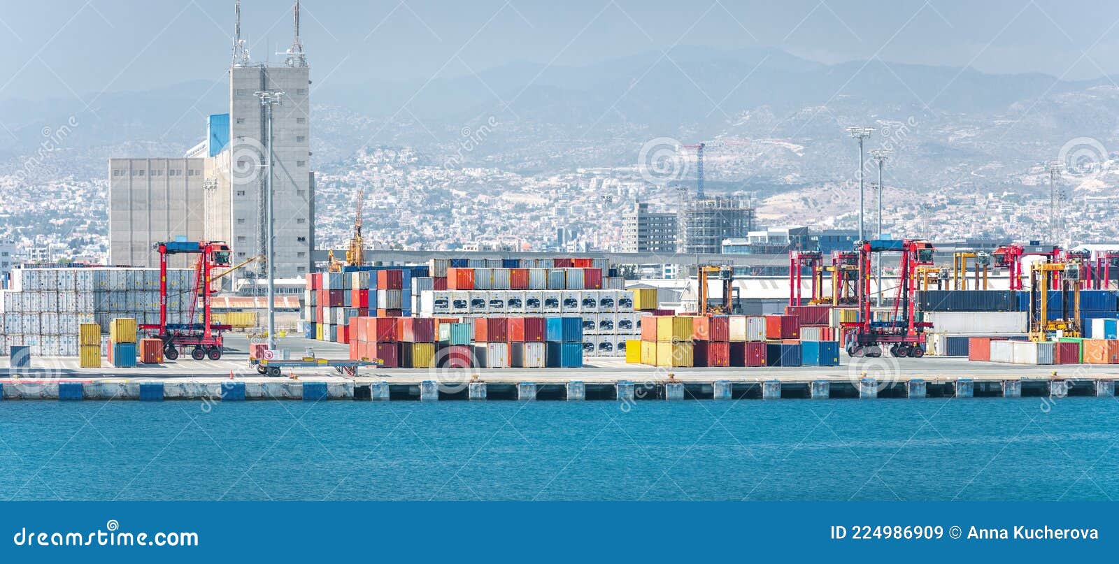 container yard with straddle carriers and other facilities in cargo terminal of limassol port