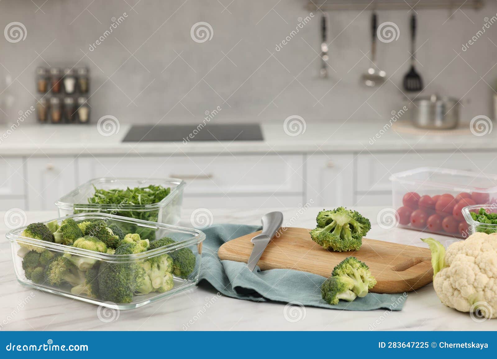 Containers with Different Fresh Products on White Marble Table, Space