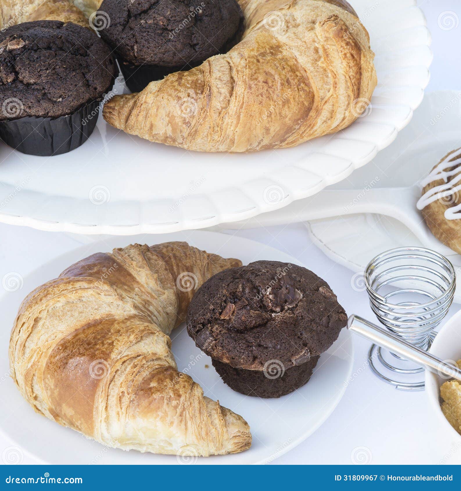 Continental Breakfast Table Setting with Pastries and Cakes Stock Image