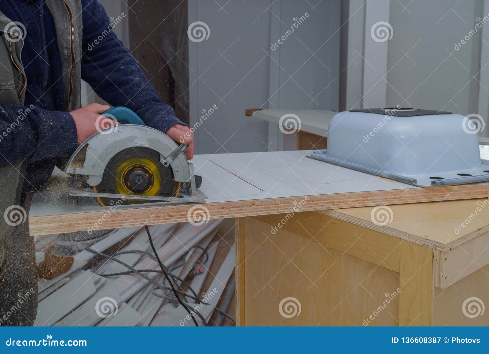 Contractor Cuts The Countertop For Sink Furniture On The Kitchen