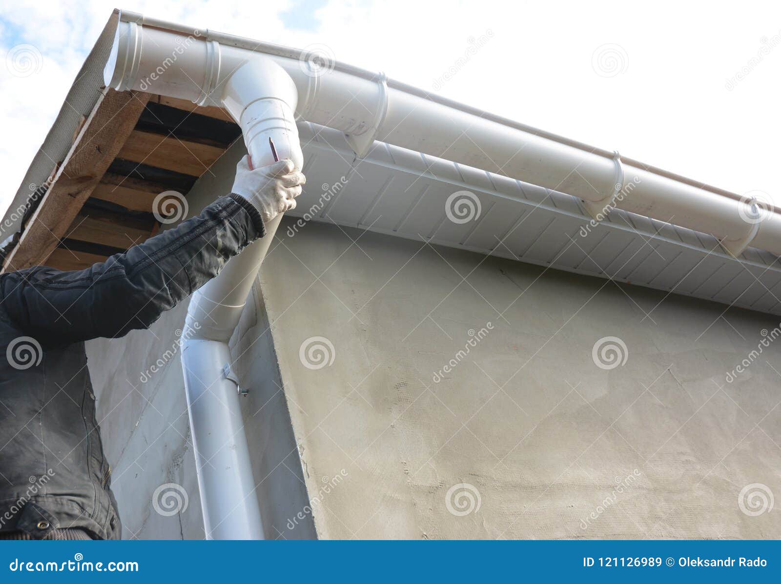 Contractor Installing Roof Gutter Downspout Pipe. Stock Image Image of builder, water 121126989