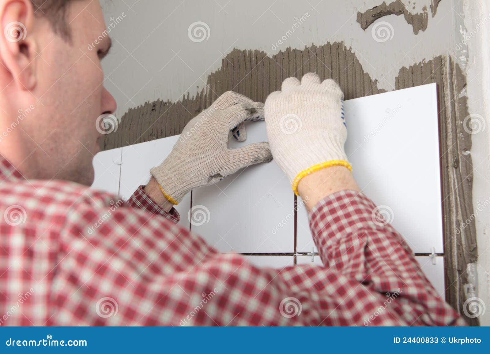 Contractor Installing Tiles Stock Image Image of adult, tiler 24400833
