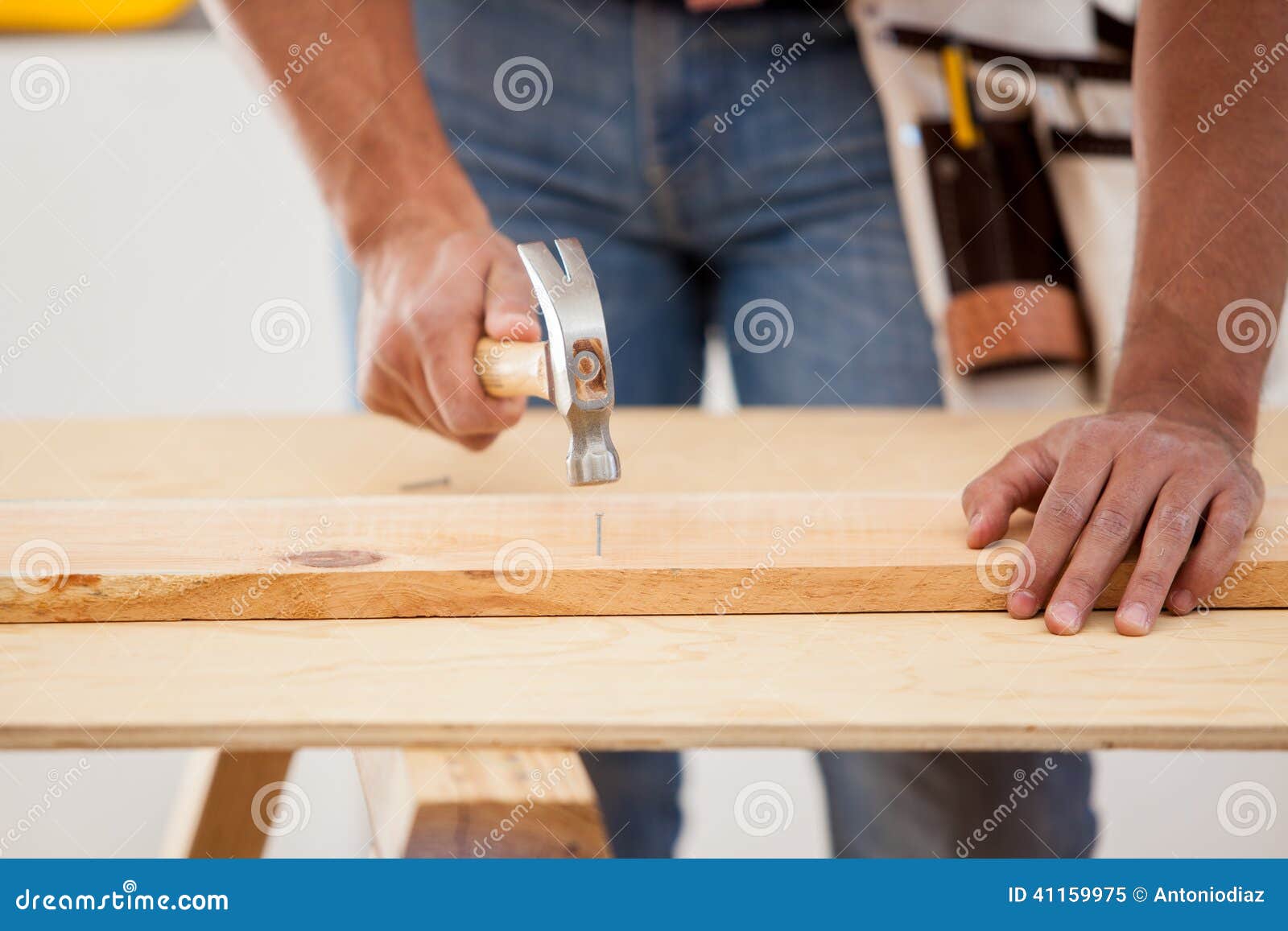 Contractor using a hammer stock image. Image of working 41159975