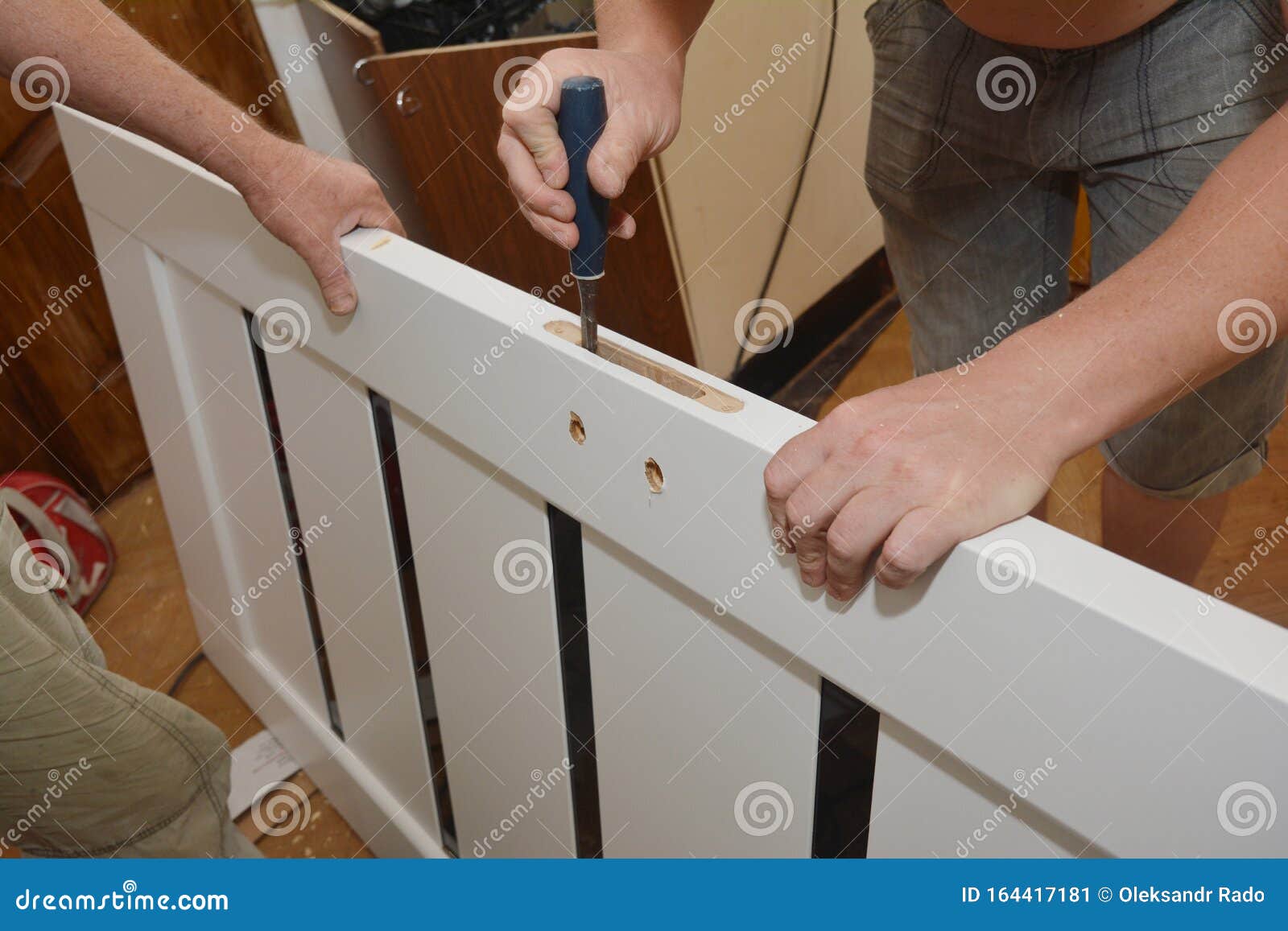 Contractors Installing Door Handle and Lock in New White House Door