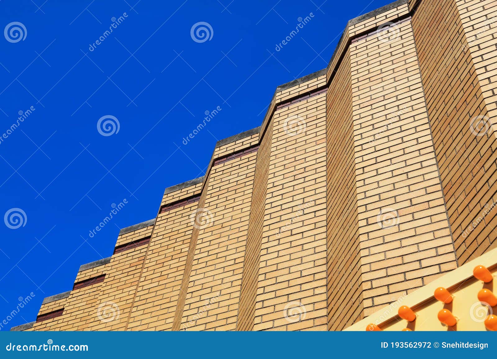 contrast background yellow wall with blue sky