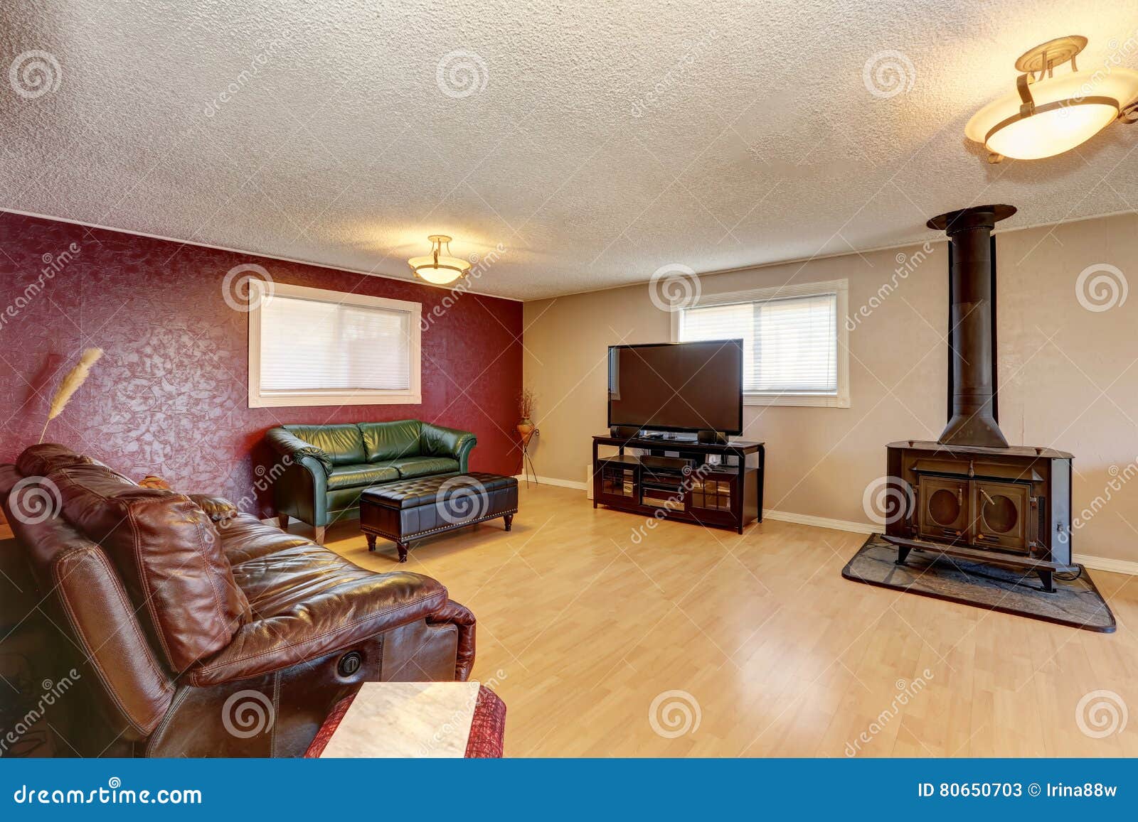 Contrast Red Wall In The Living Room With Antique Fireplace Stock