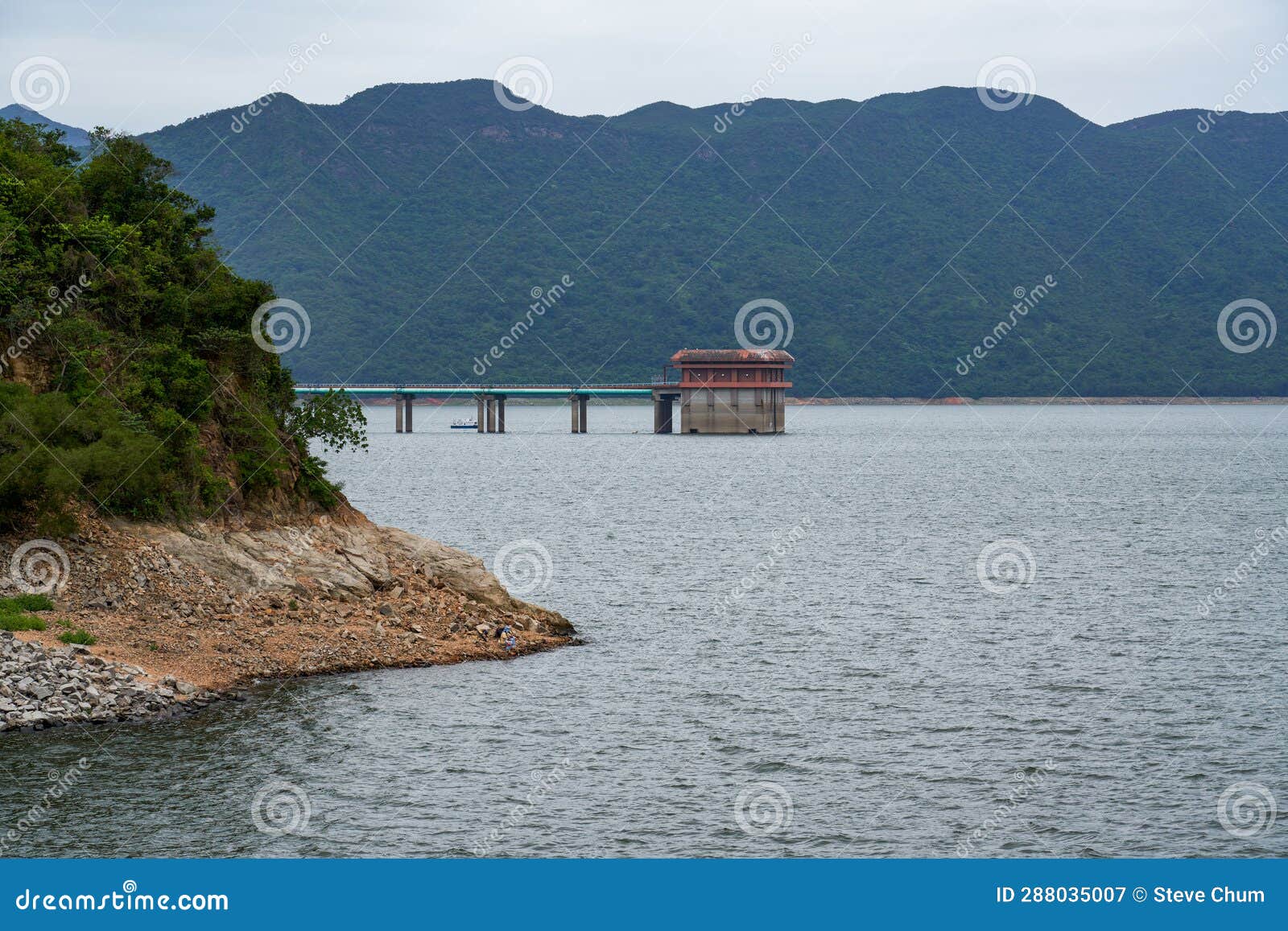 control room and connecting bridge at the center of the hong kong reservoir