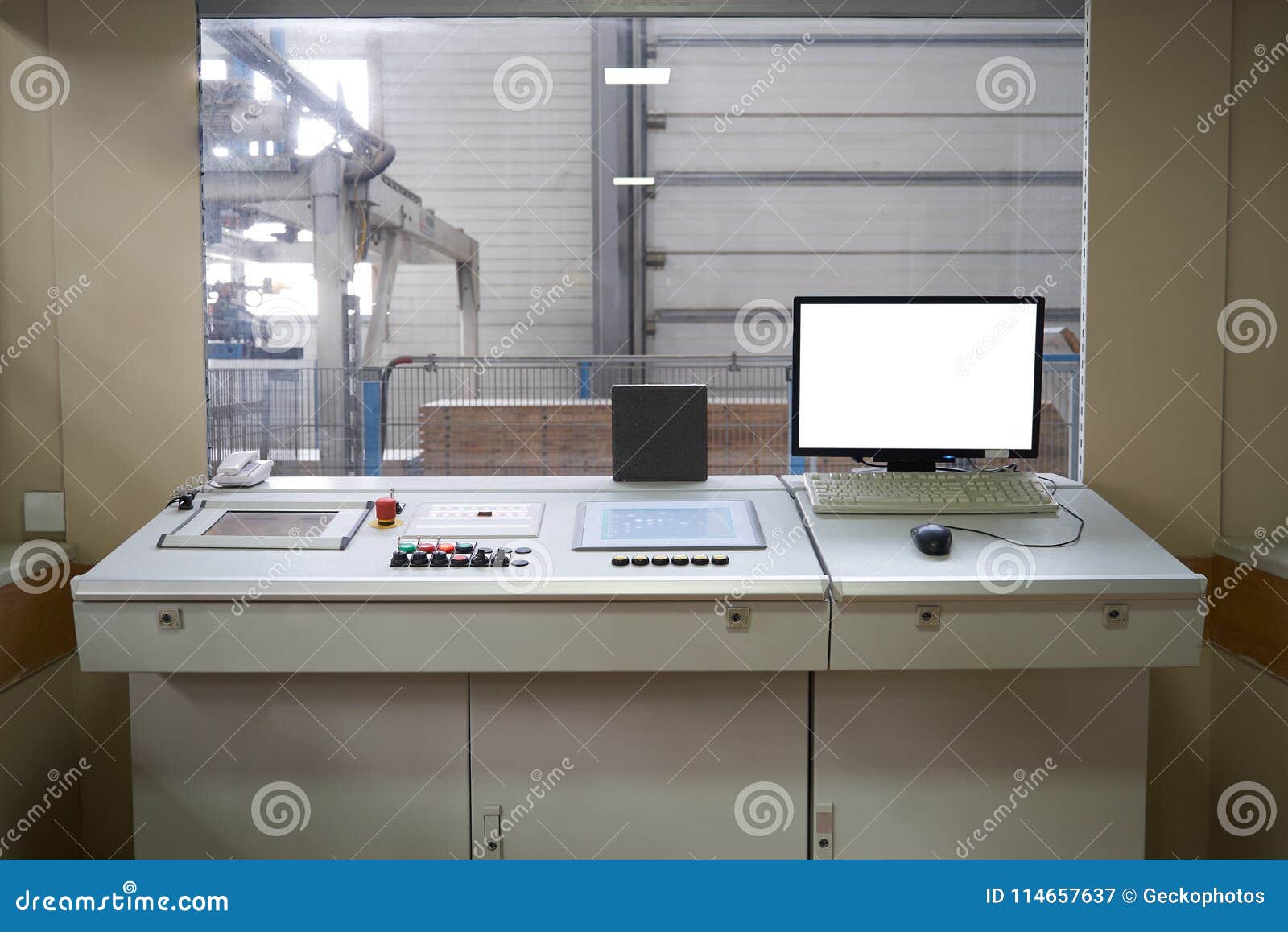 Control Room Interior With Computer Monitor And Controller Devices