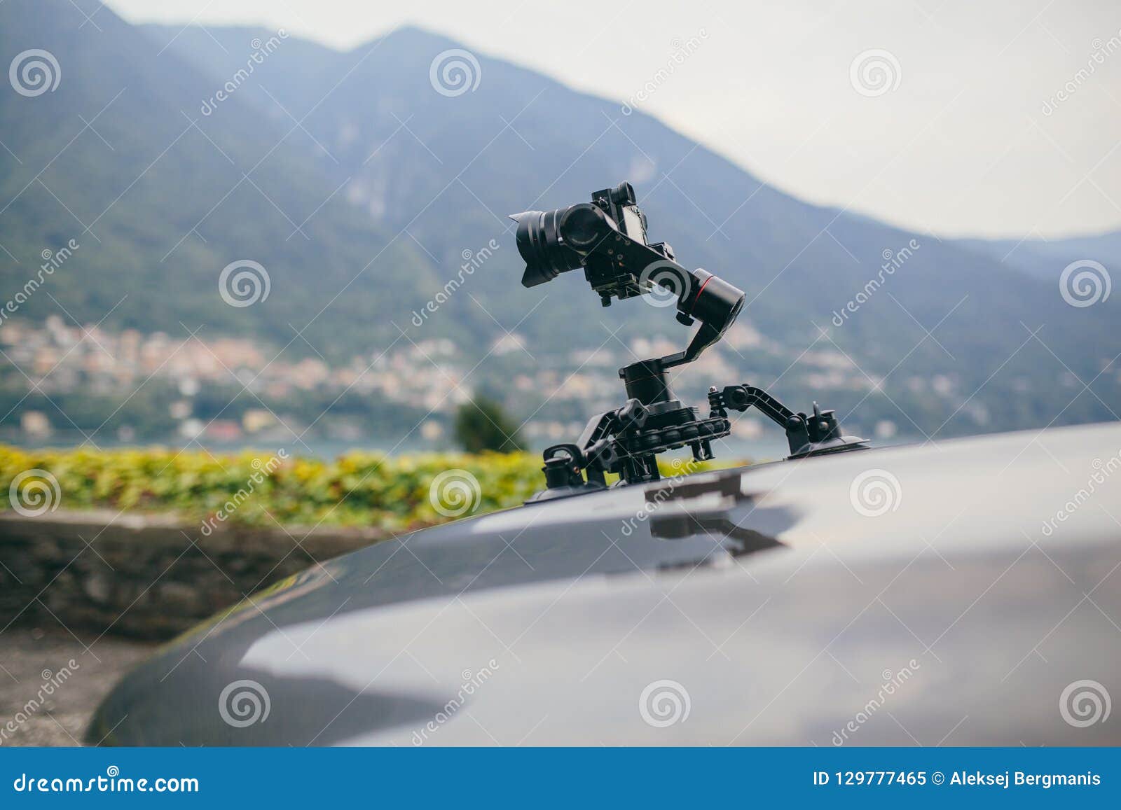 Camera Gimbal on the Car Steadicam Keeps on Suckers on the Auto Car