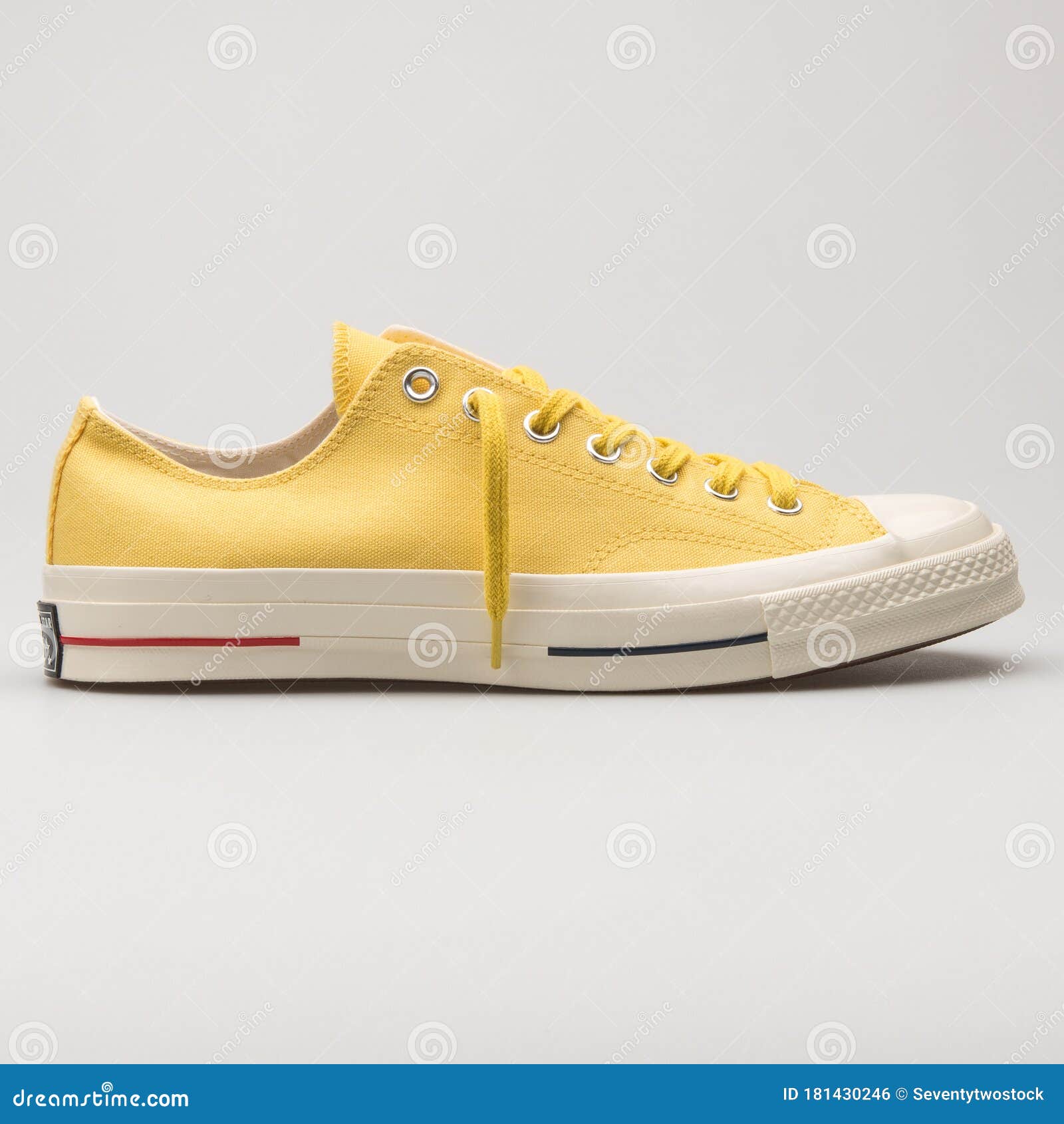 yellow and white converse