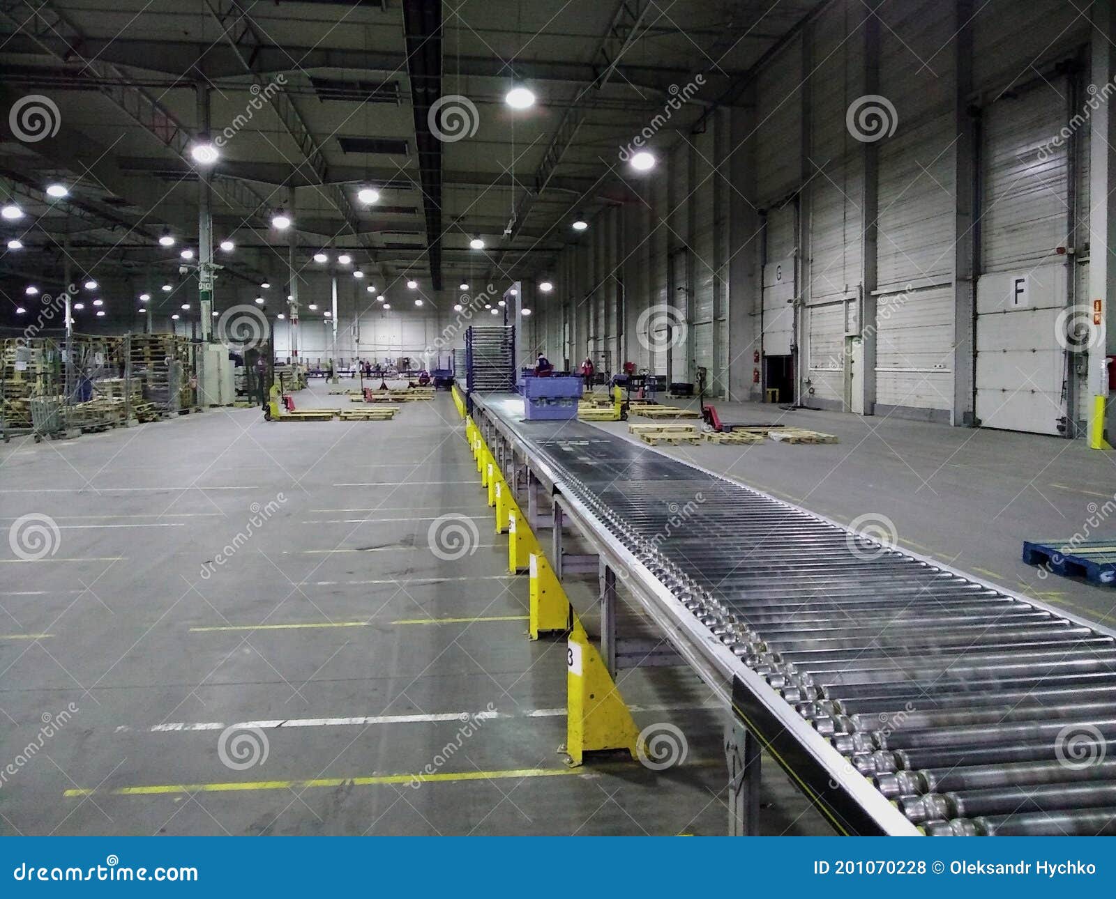 Photo of Conveyor Belt in the Warehouse Stock Photo Image of aluminum, distribution 201070228