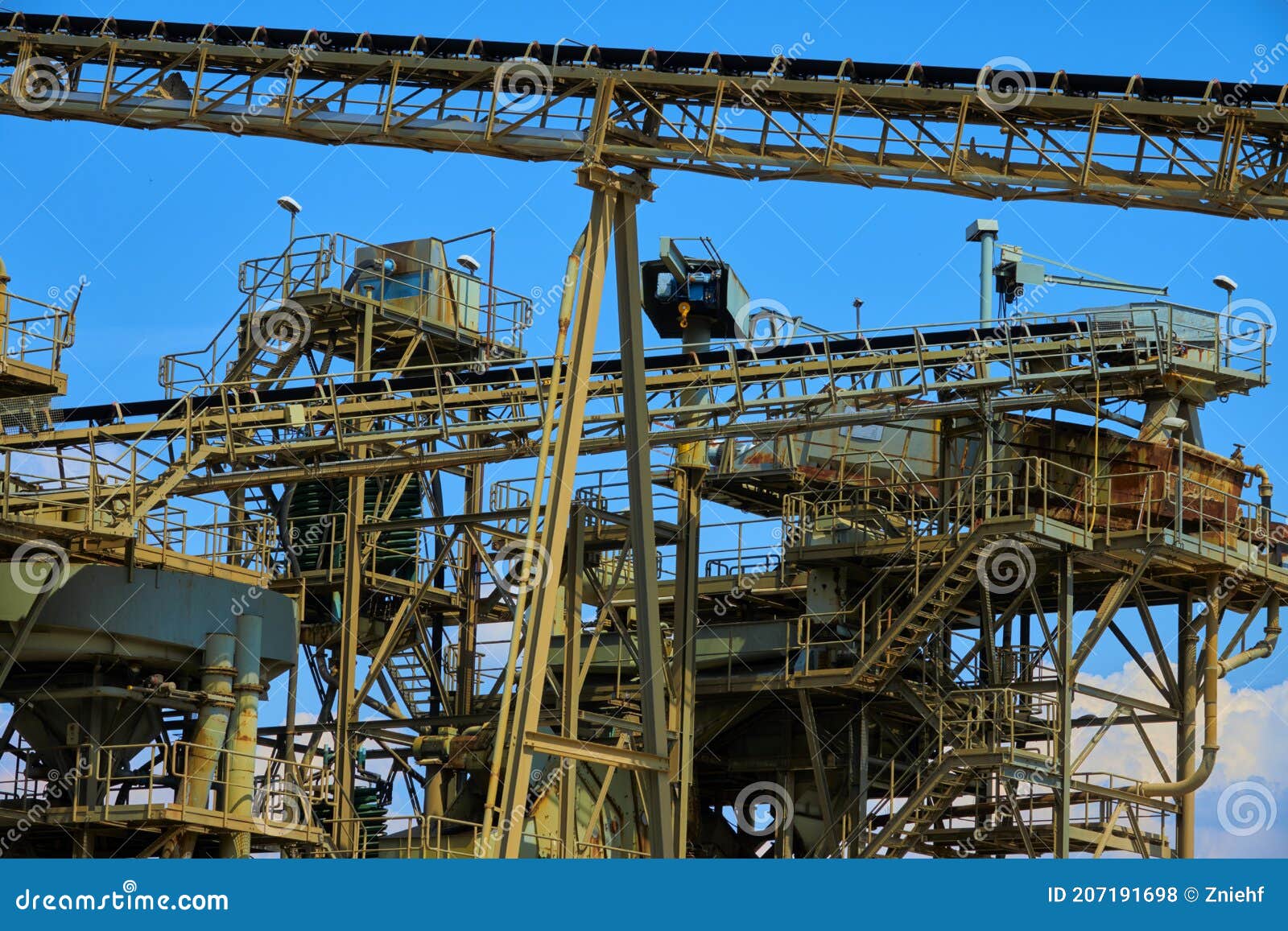 Conveyor Belts in Front of the Collection Warehouse of a Sand Mining