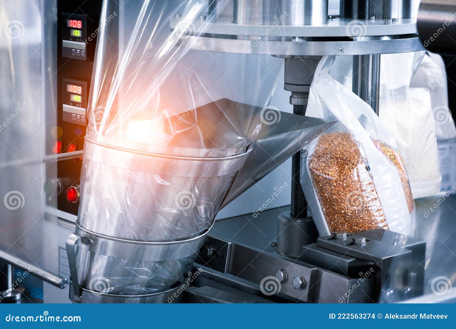 conveyor filling and packaging machine for food. product packaging concept, buckwheat groats